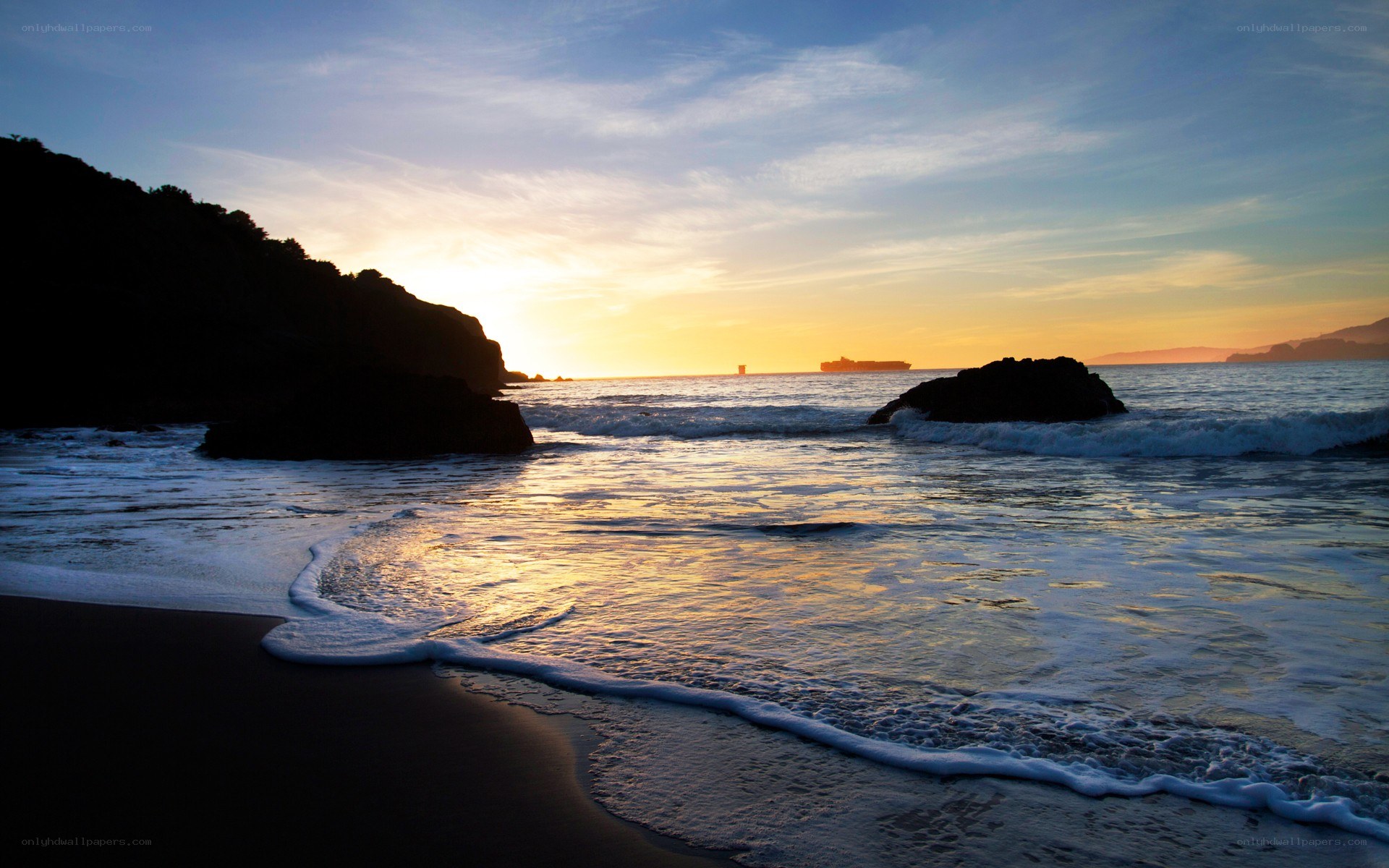 Sunset at the rocky beach