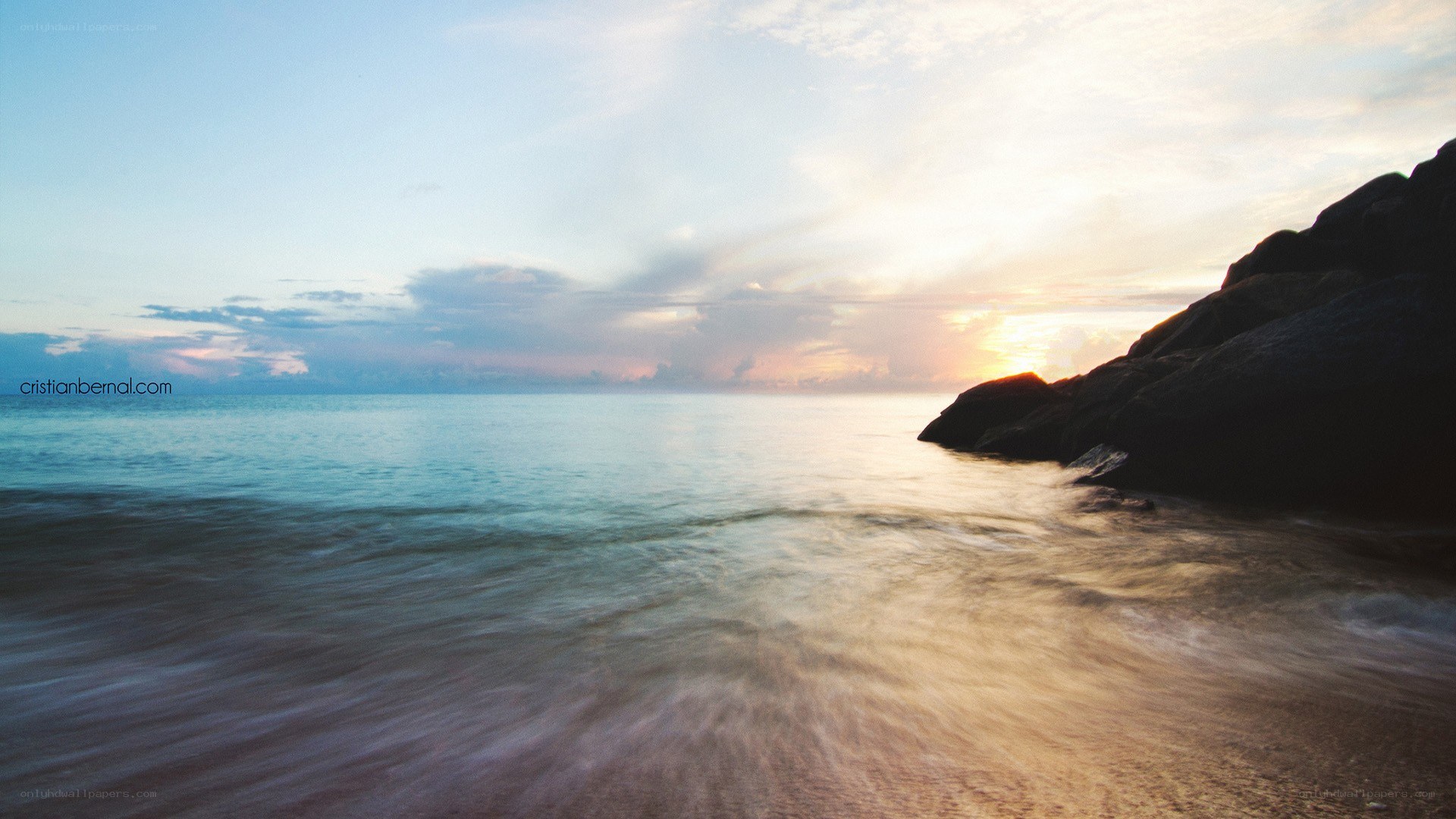 Sunset at the rocky beach