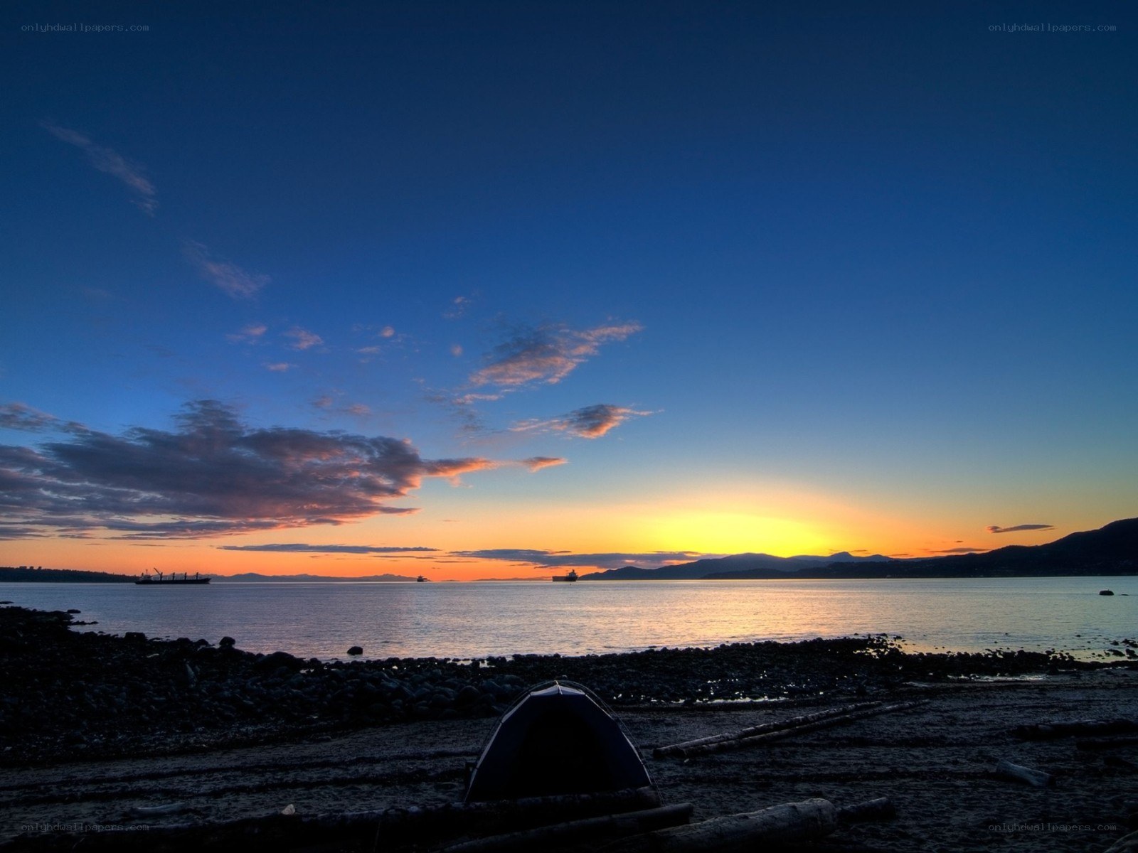 Sunset at the rocky beach