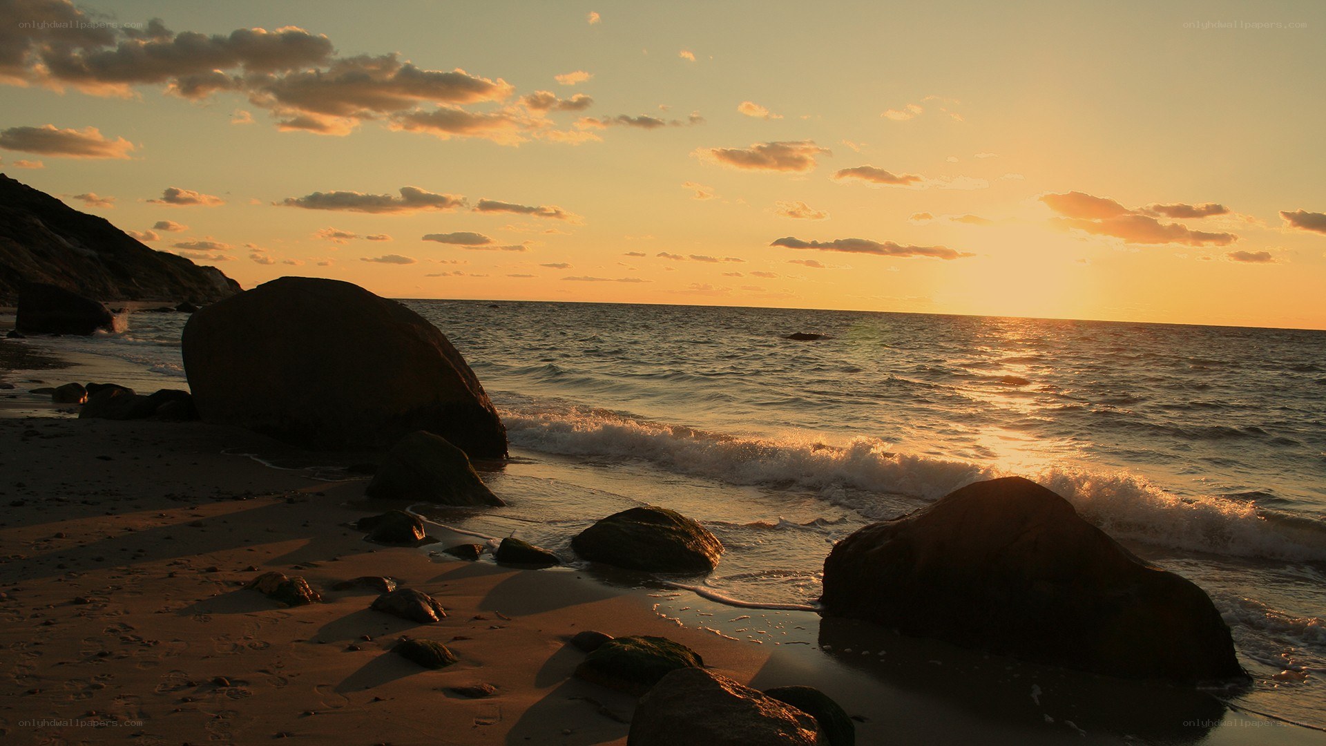 Sunset at the rocky beach