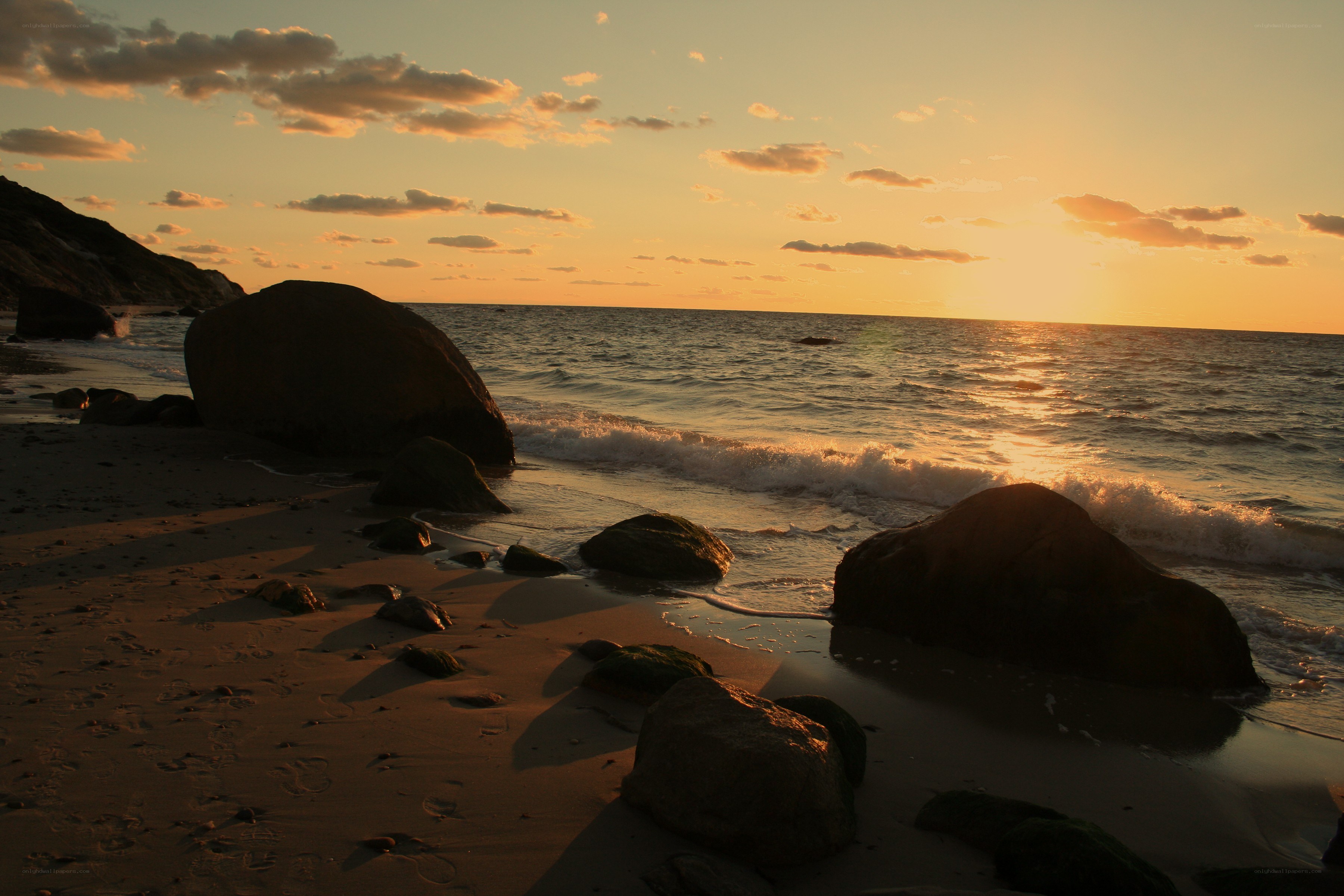 Sunset at the rocky beach