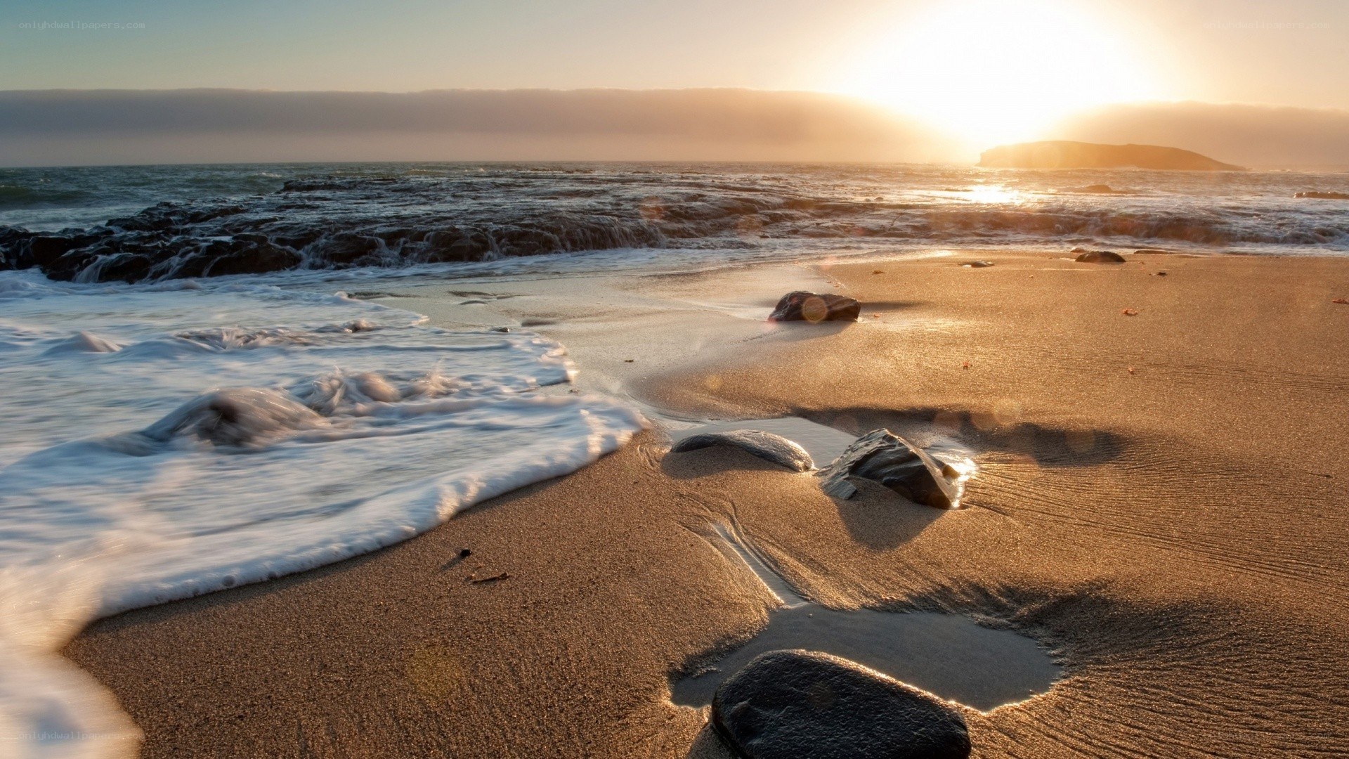 Sunset at the rocky beach