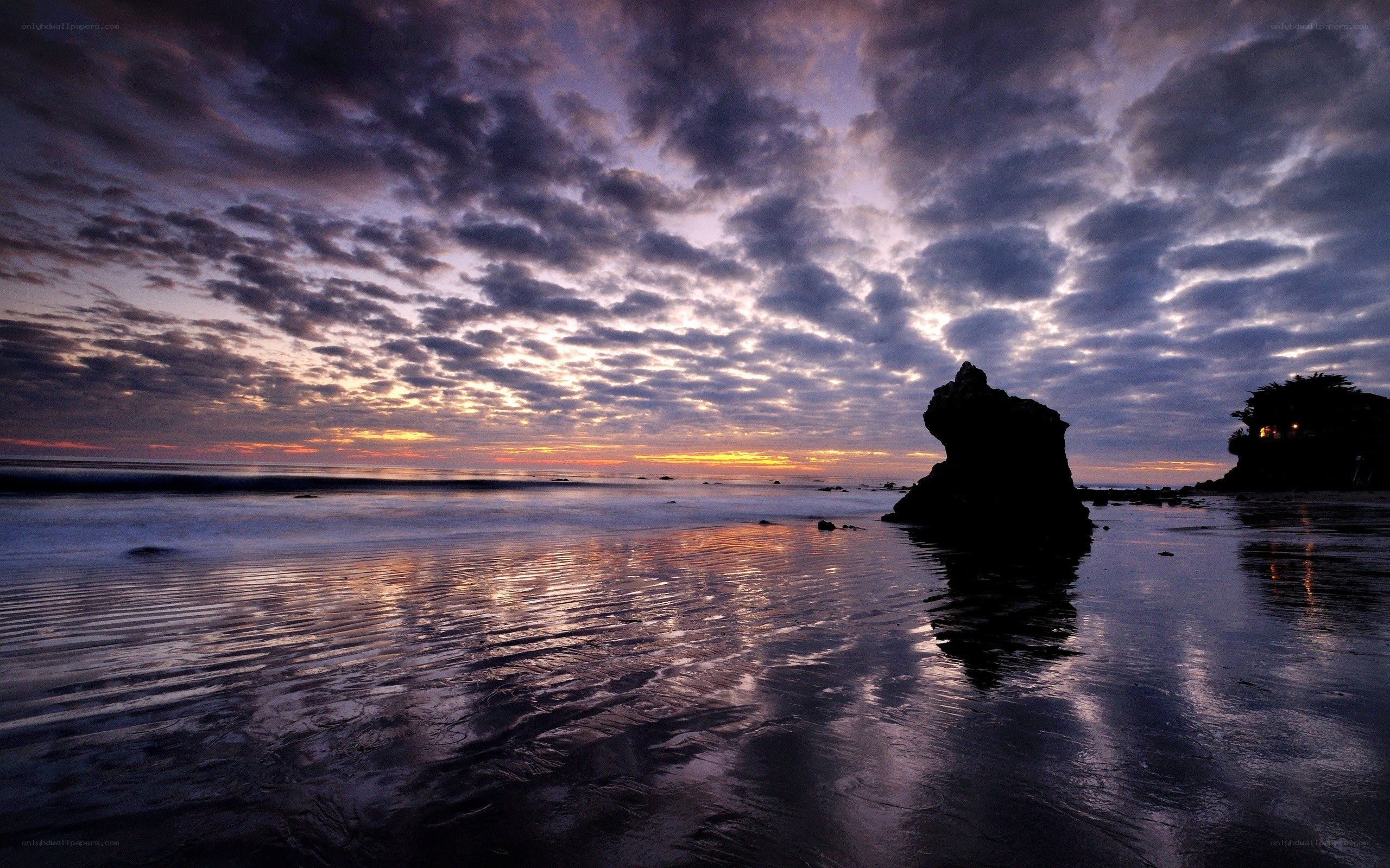 Sunset at the rocky beach