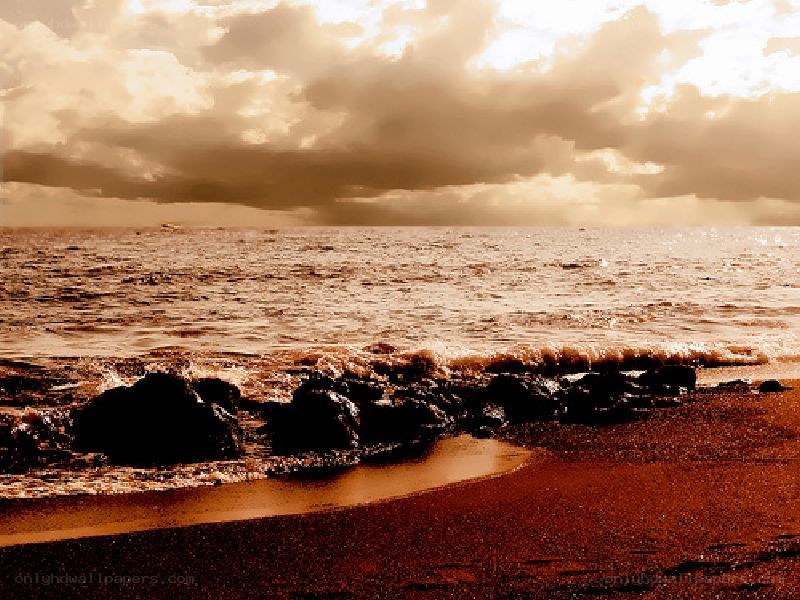 Sunset at the rocky beach