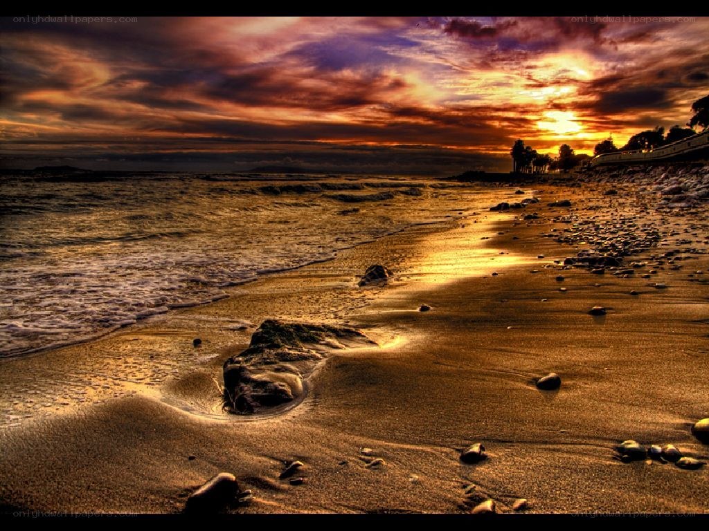 Sunset at the rocky beach