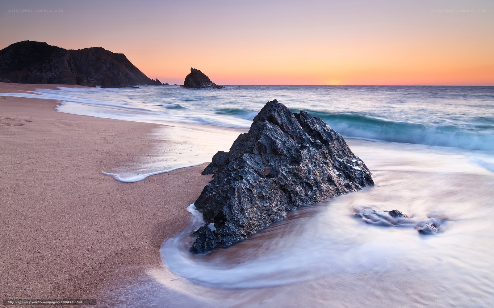 Sunset at the rocky beach