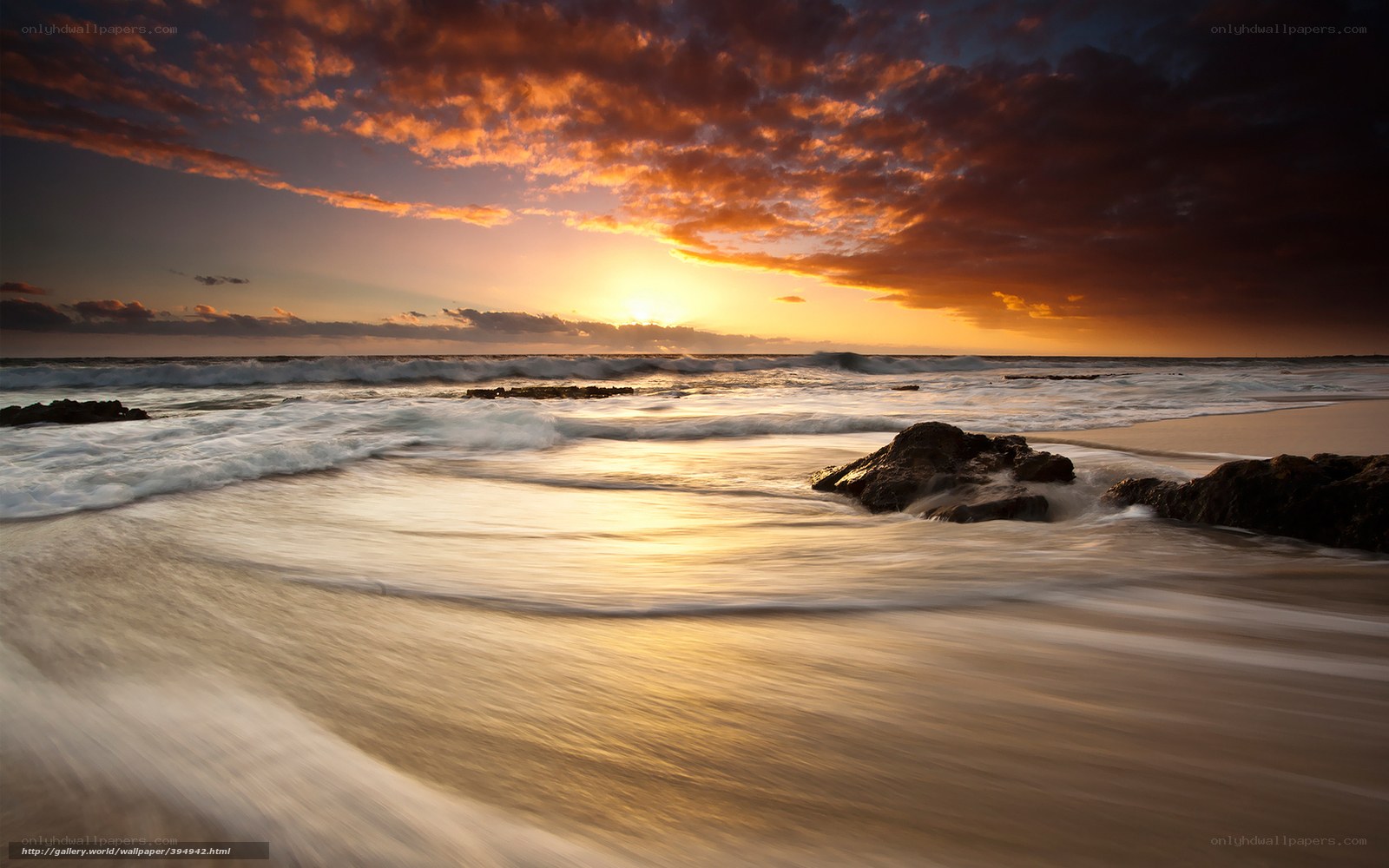 Sunset at the rocky beach