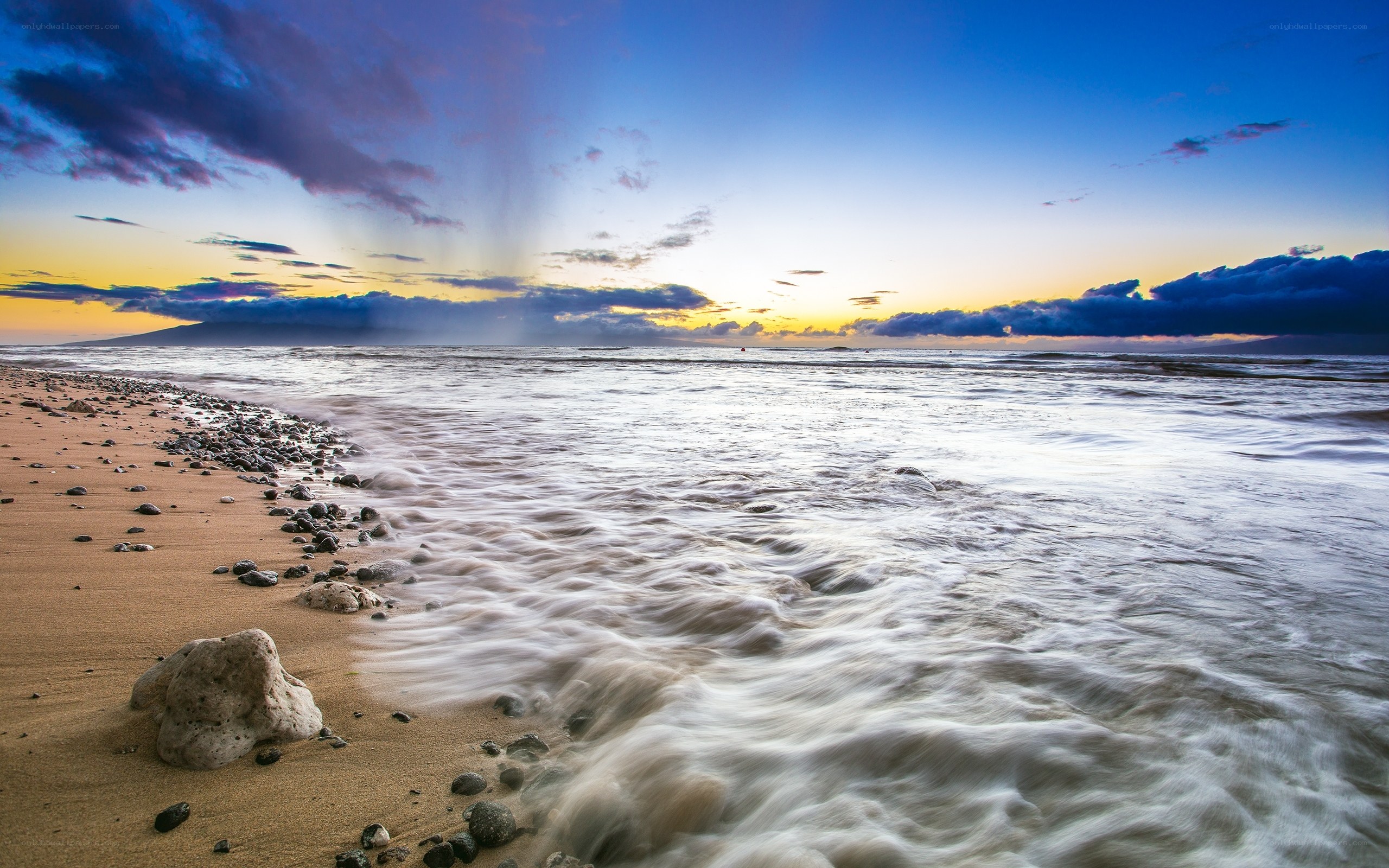 Sunset at the rocky beach