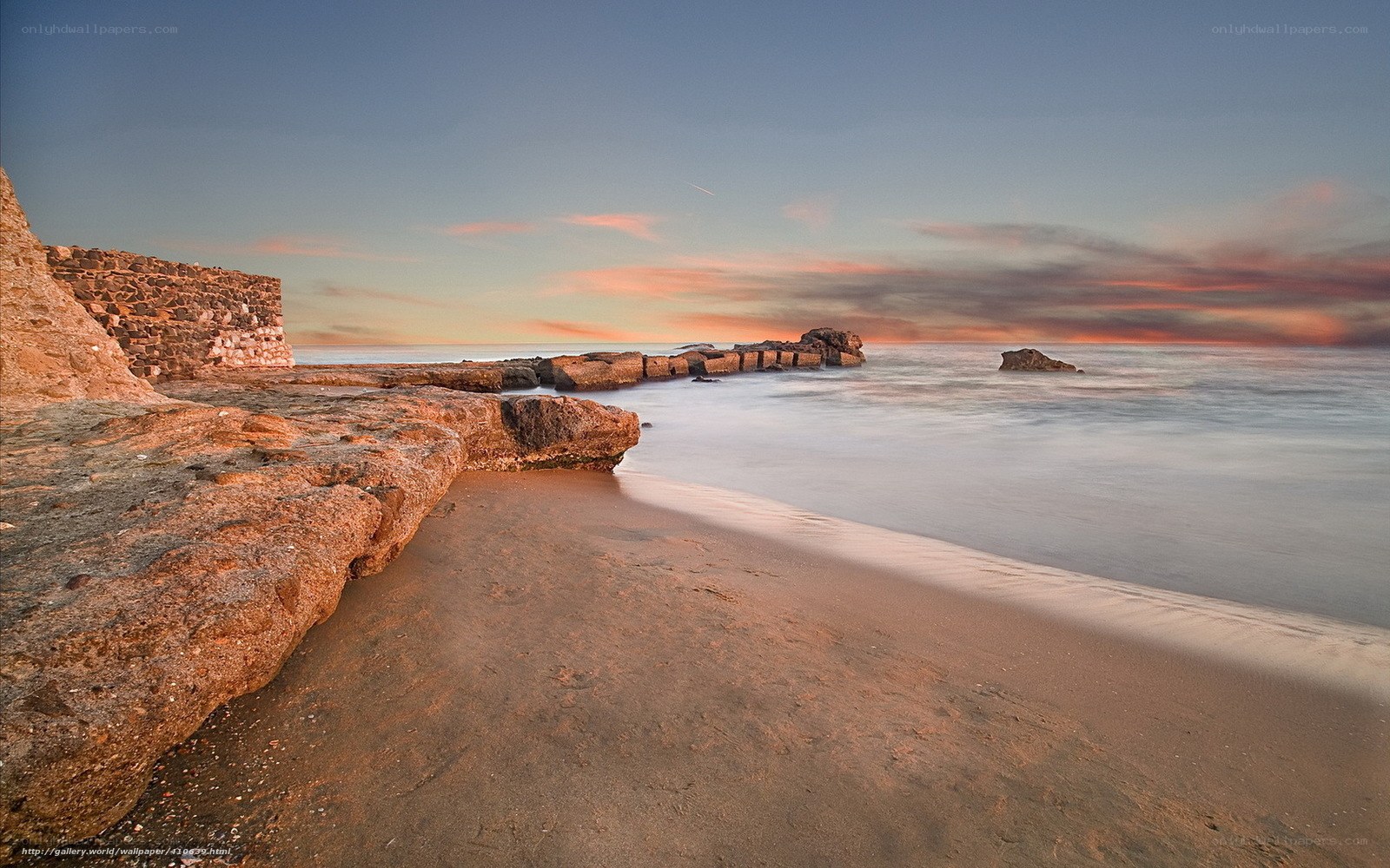 Sunset at the rocky beach