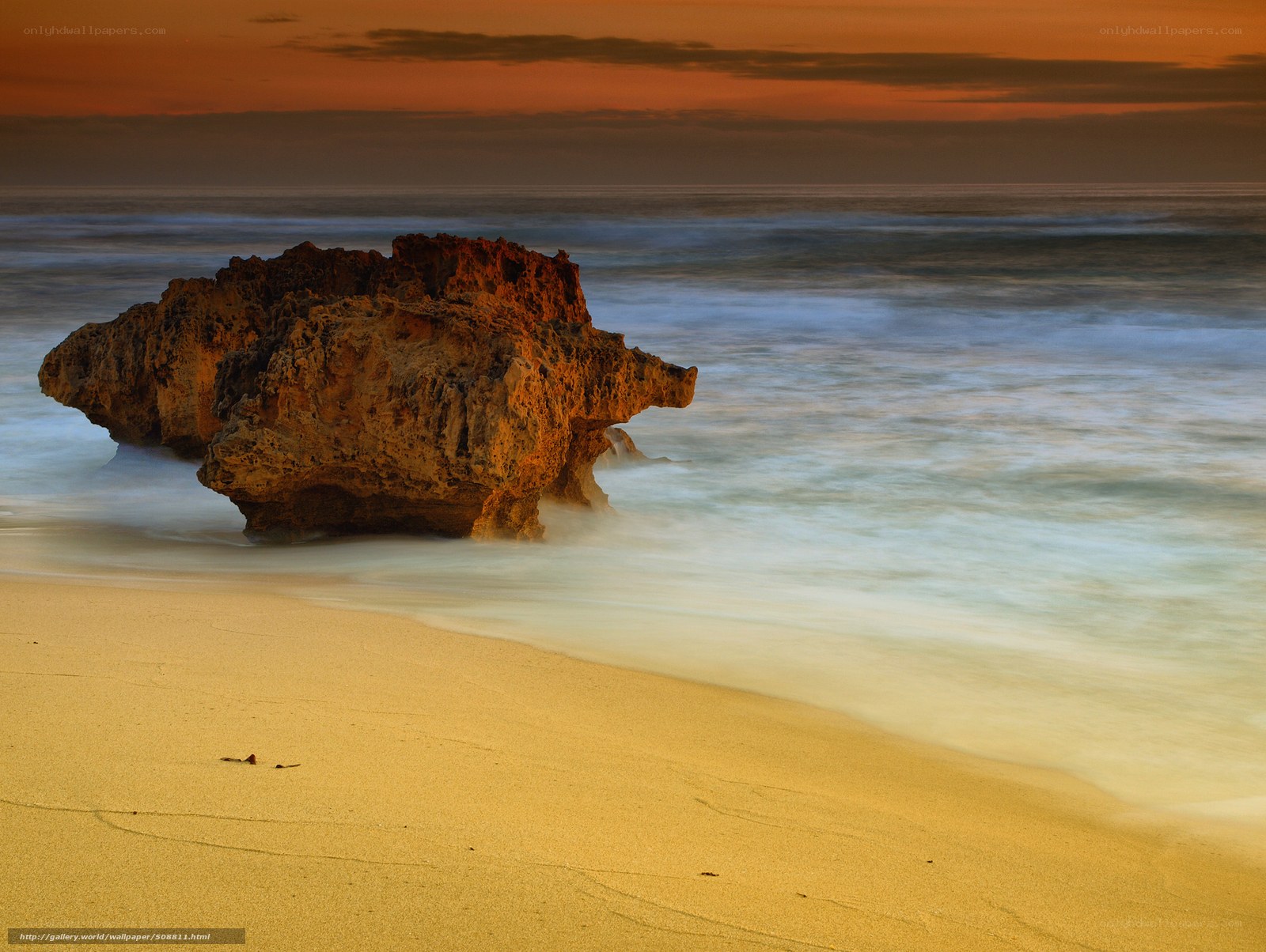 Sunset at the rocky beach