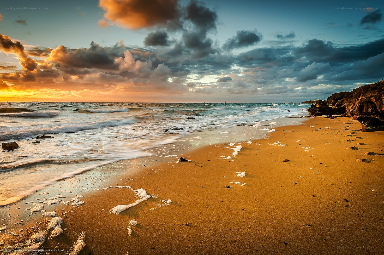 Sunset at the rocky beach