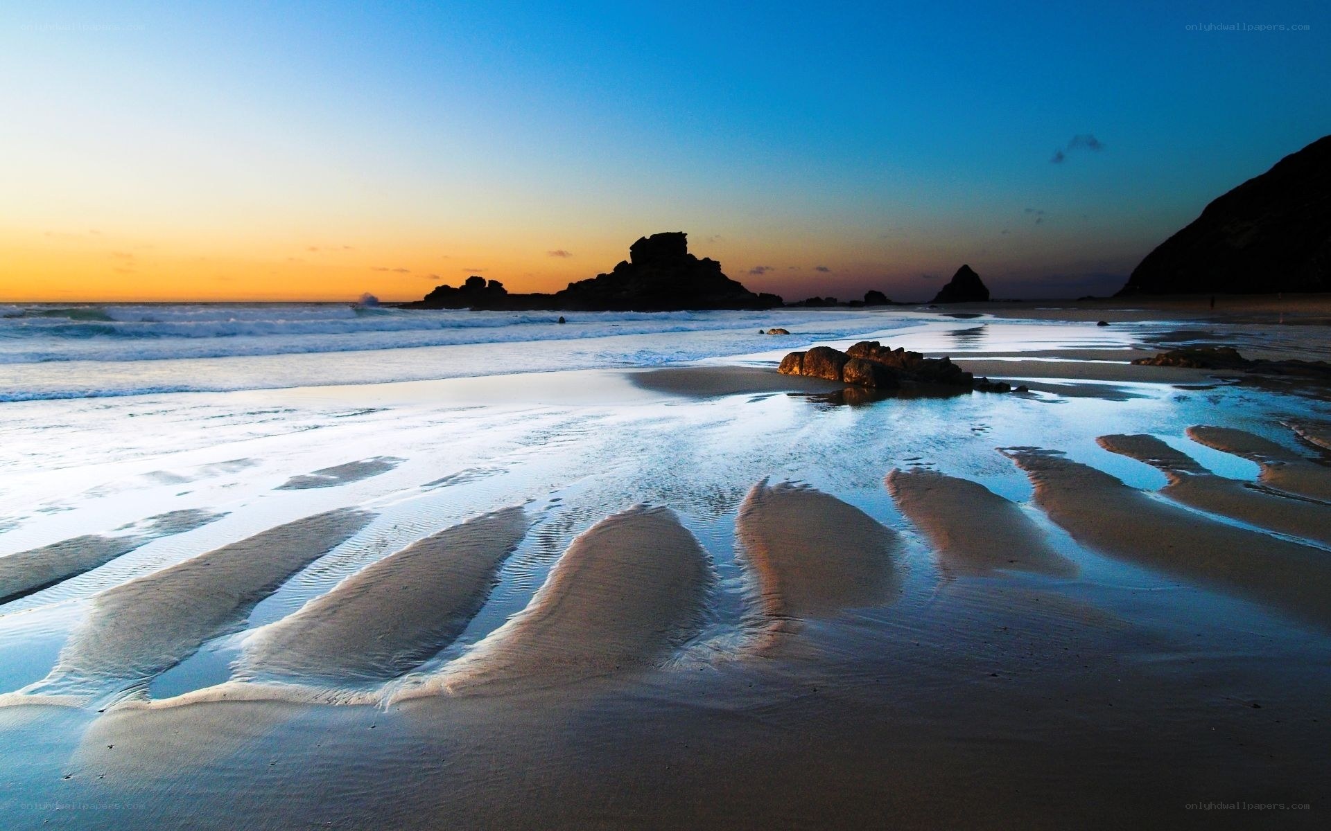 Sunset at the rocky beach
