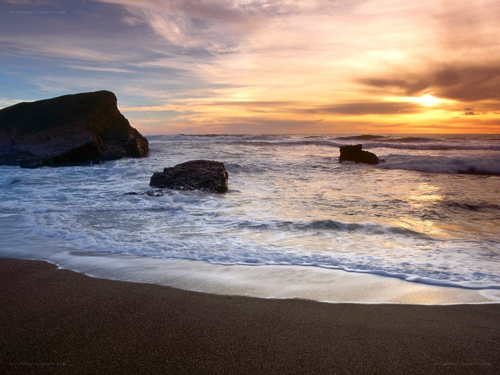 Sunset at the rocky beach