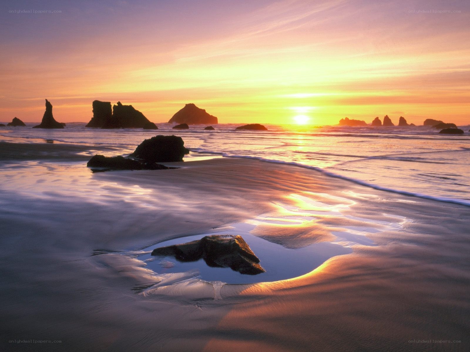 Sunset at the rocky beach