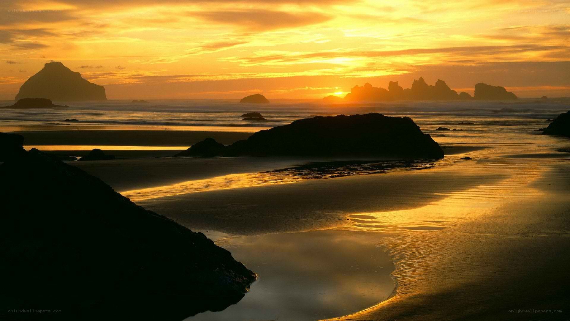 Sunset at the rocky beach