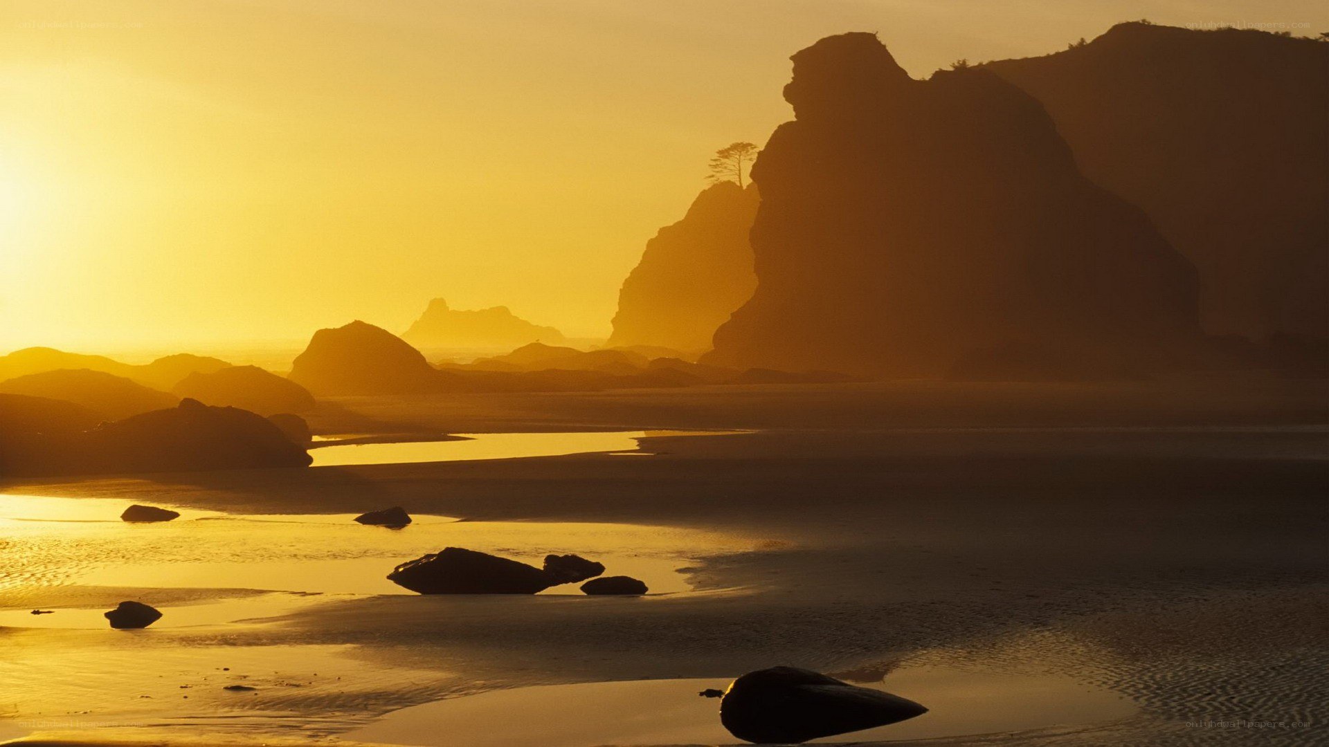 Sunset at the rocky beach