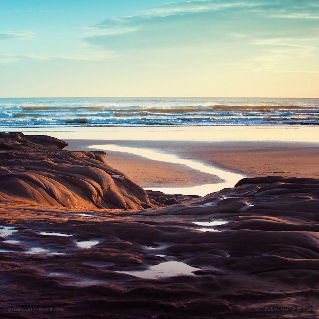 Sunset at the rocky beach