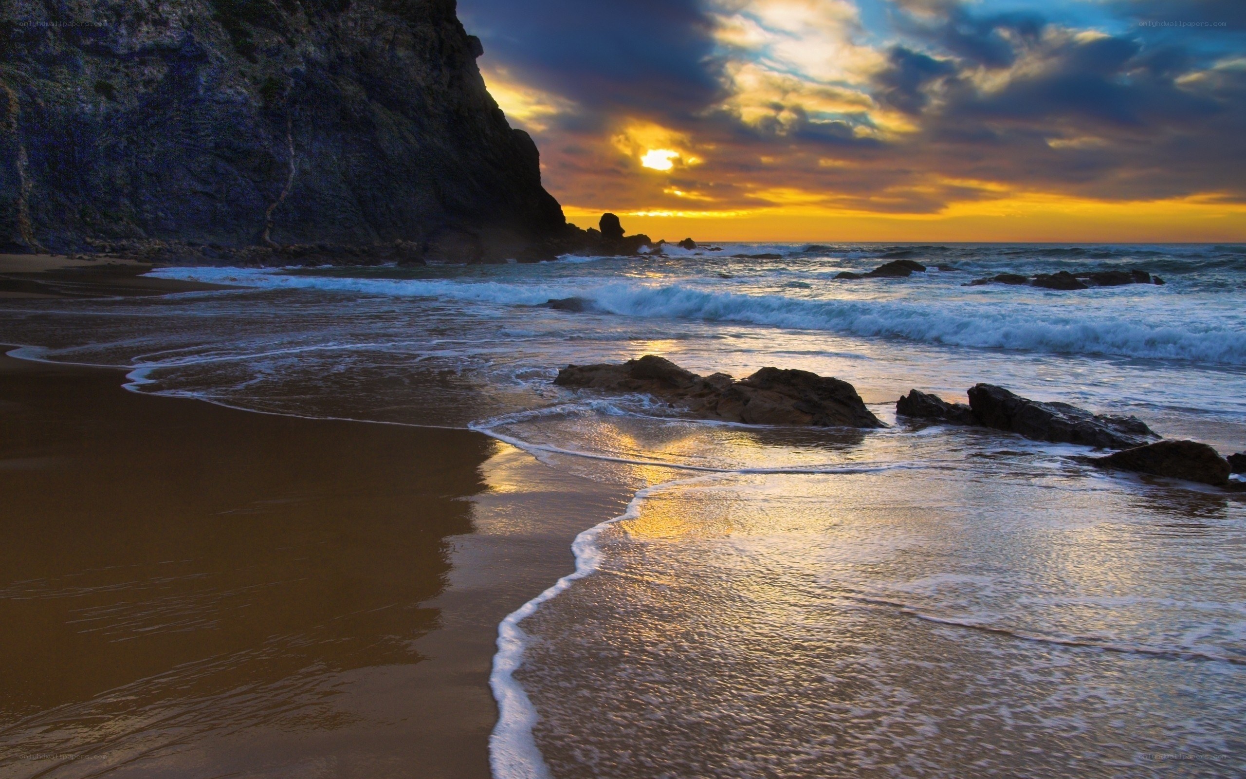 Sunset at the rocky beach