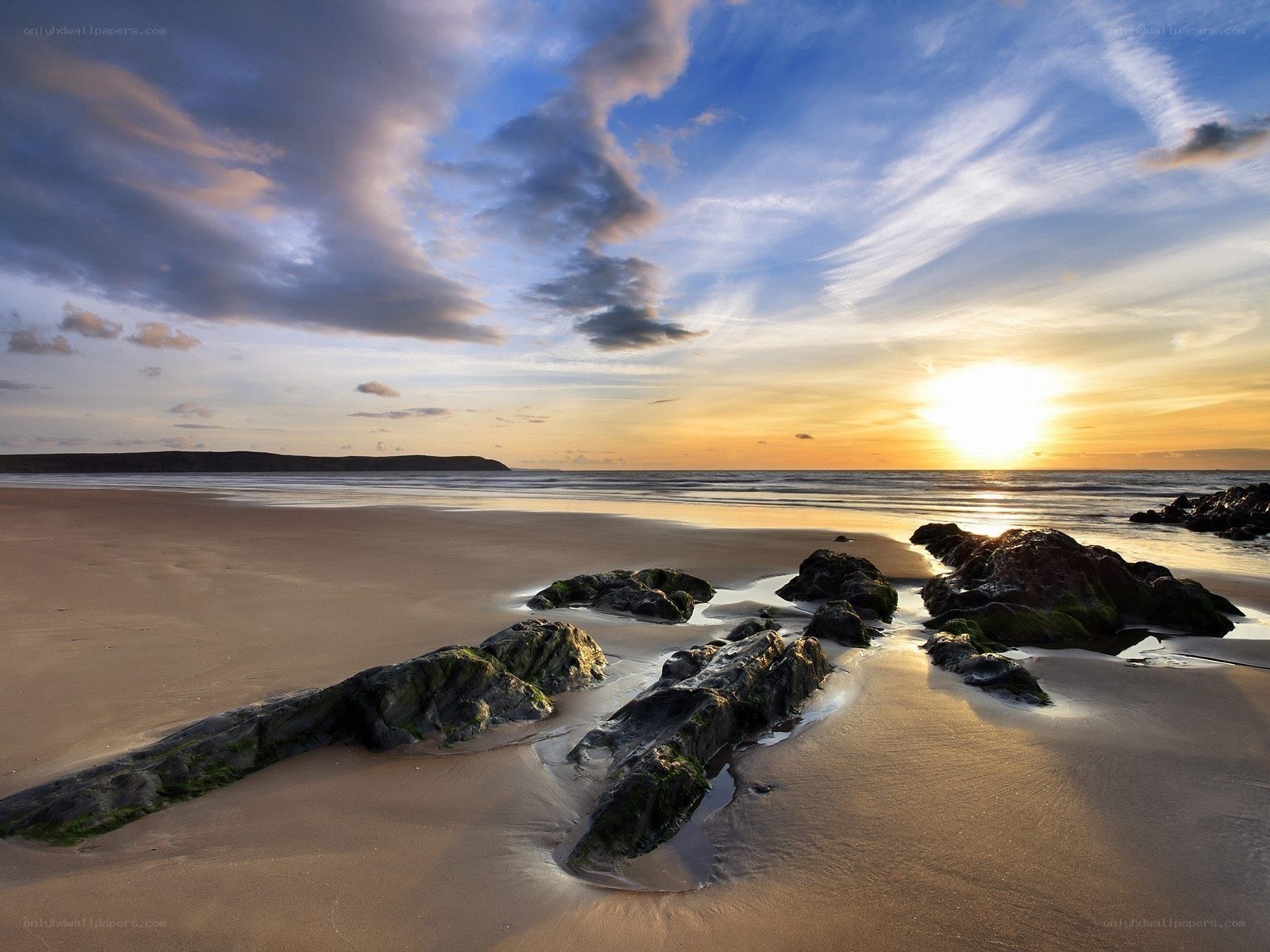 Sunset at the rocky beach