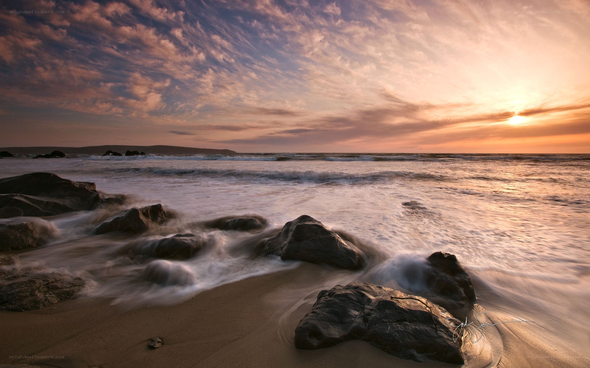 Sunset at the rocky beach