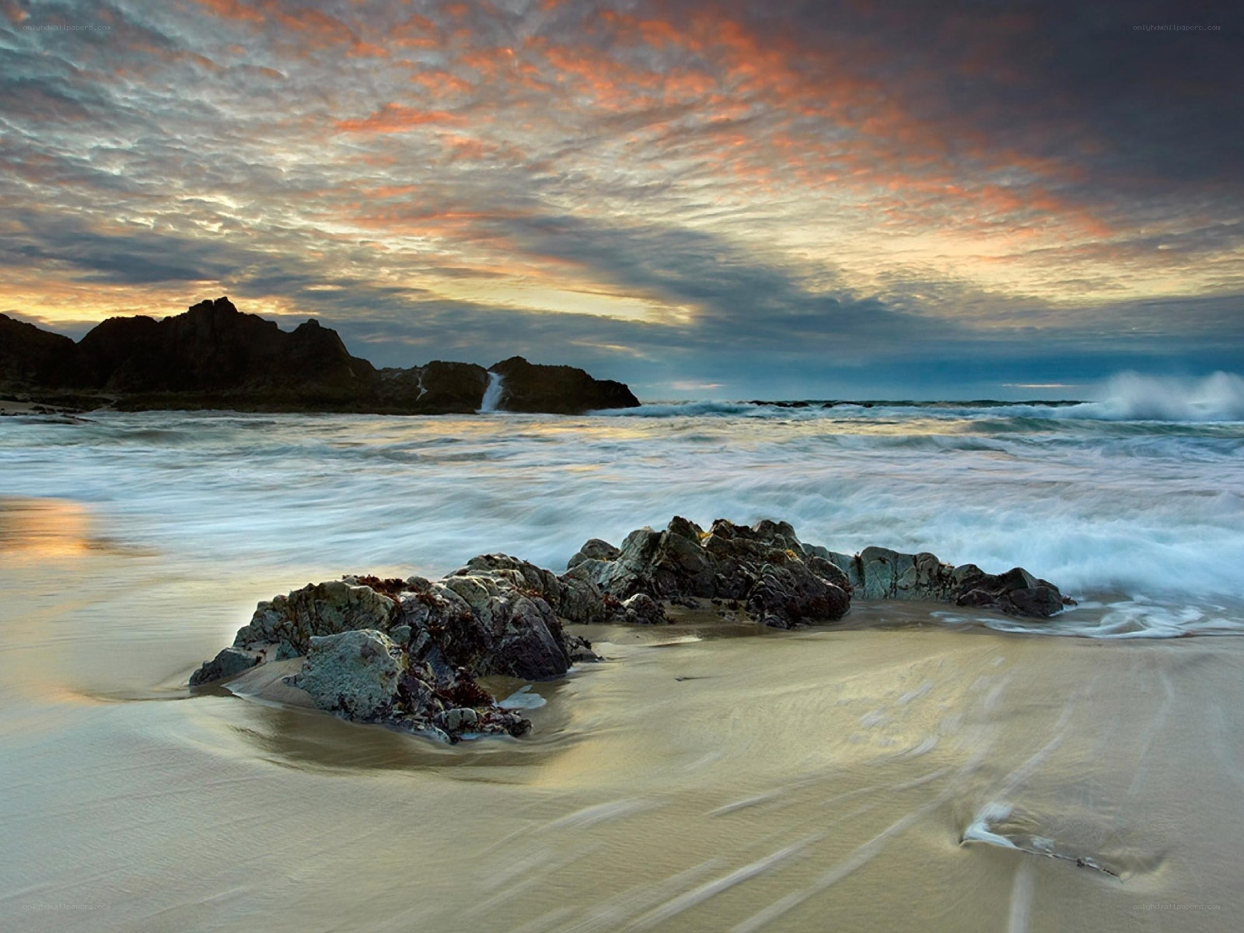 Sunset at the rocky beach