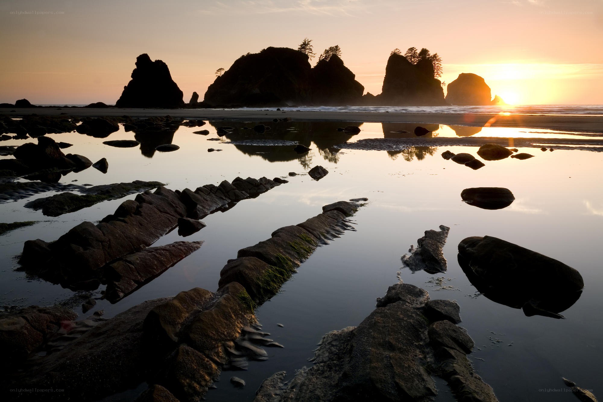 Sunset at the rocky beach