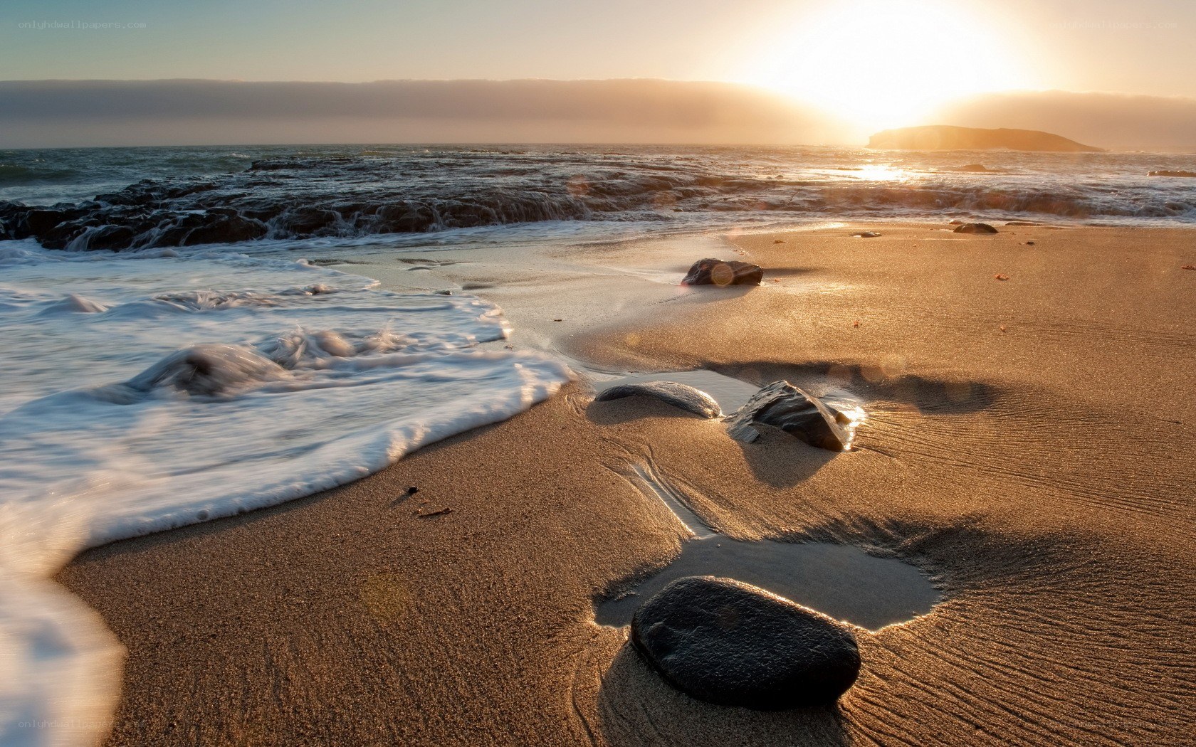 Sunset at the rocky beach