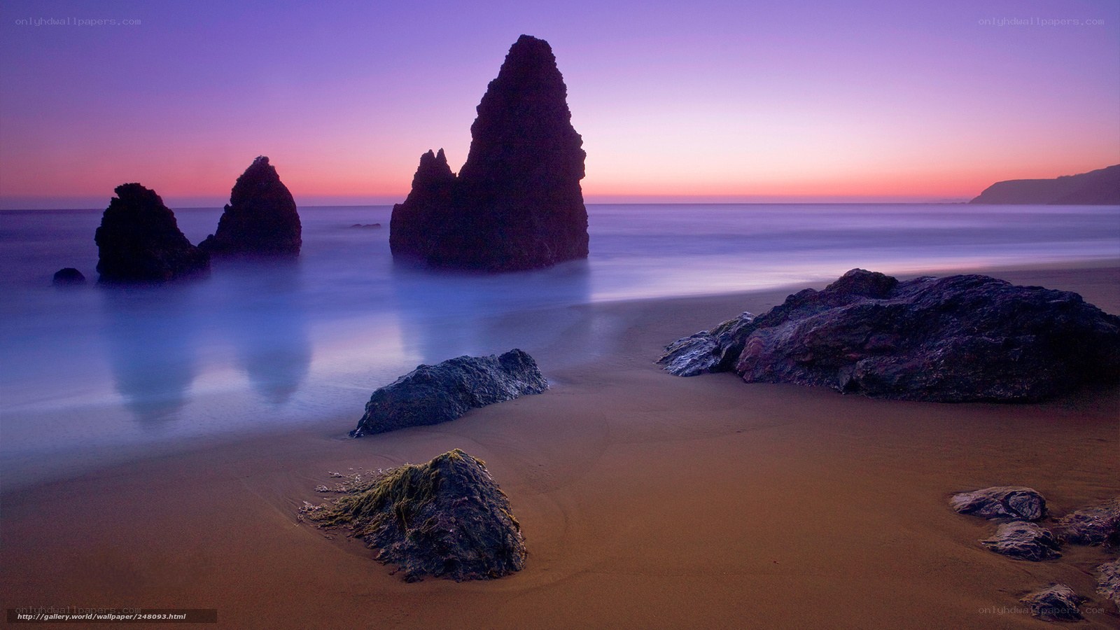 Sunset at the rocky beach