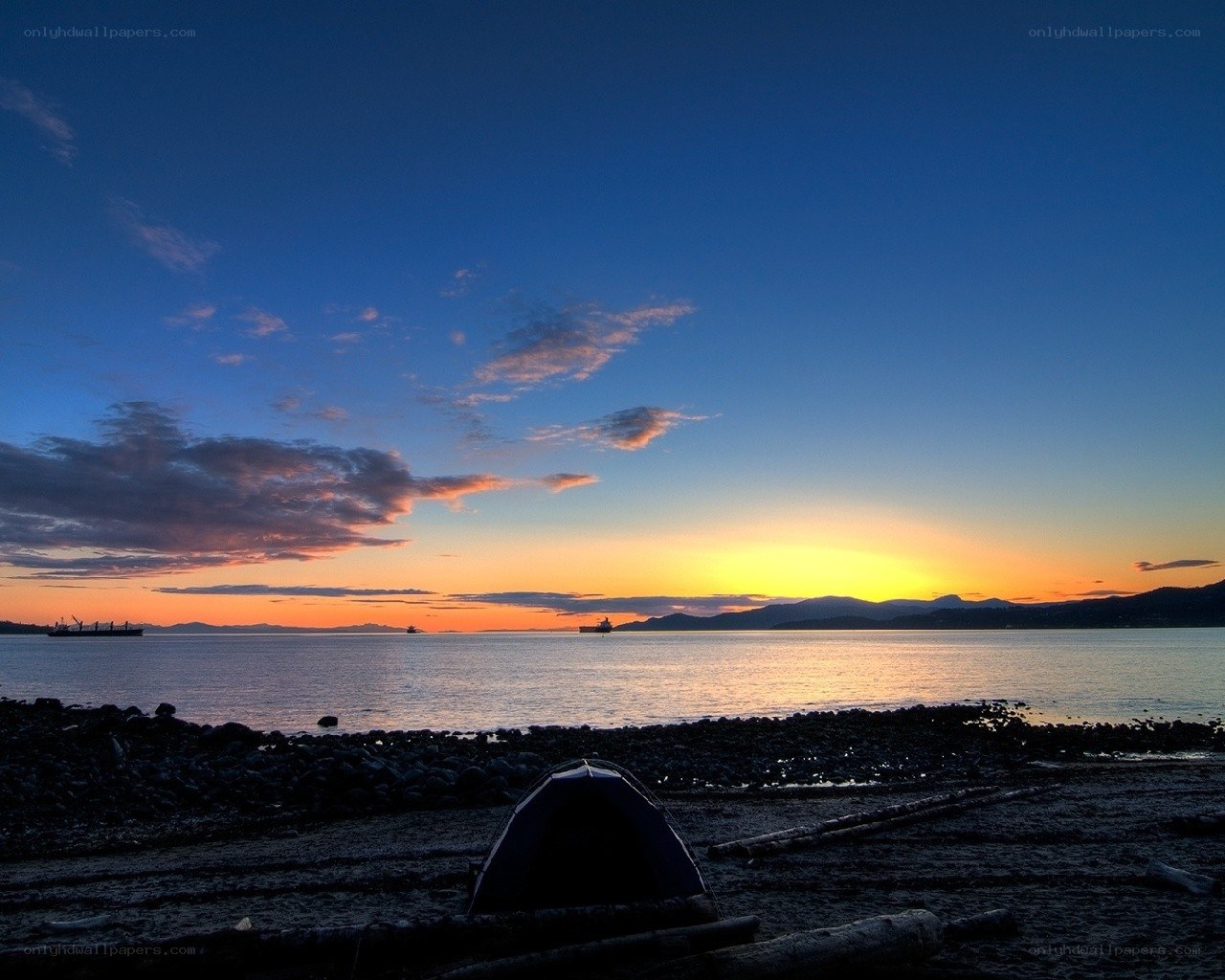 Sunset at the rocky beach
