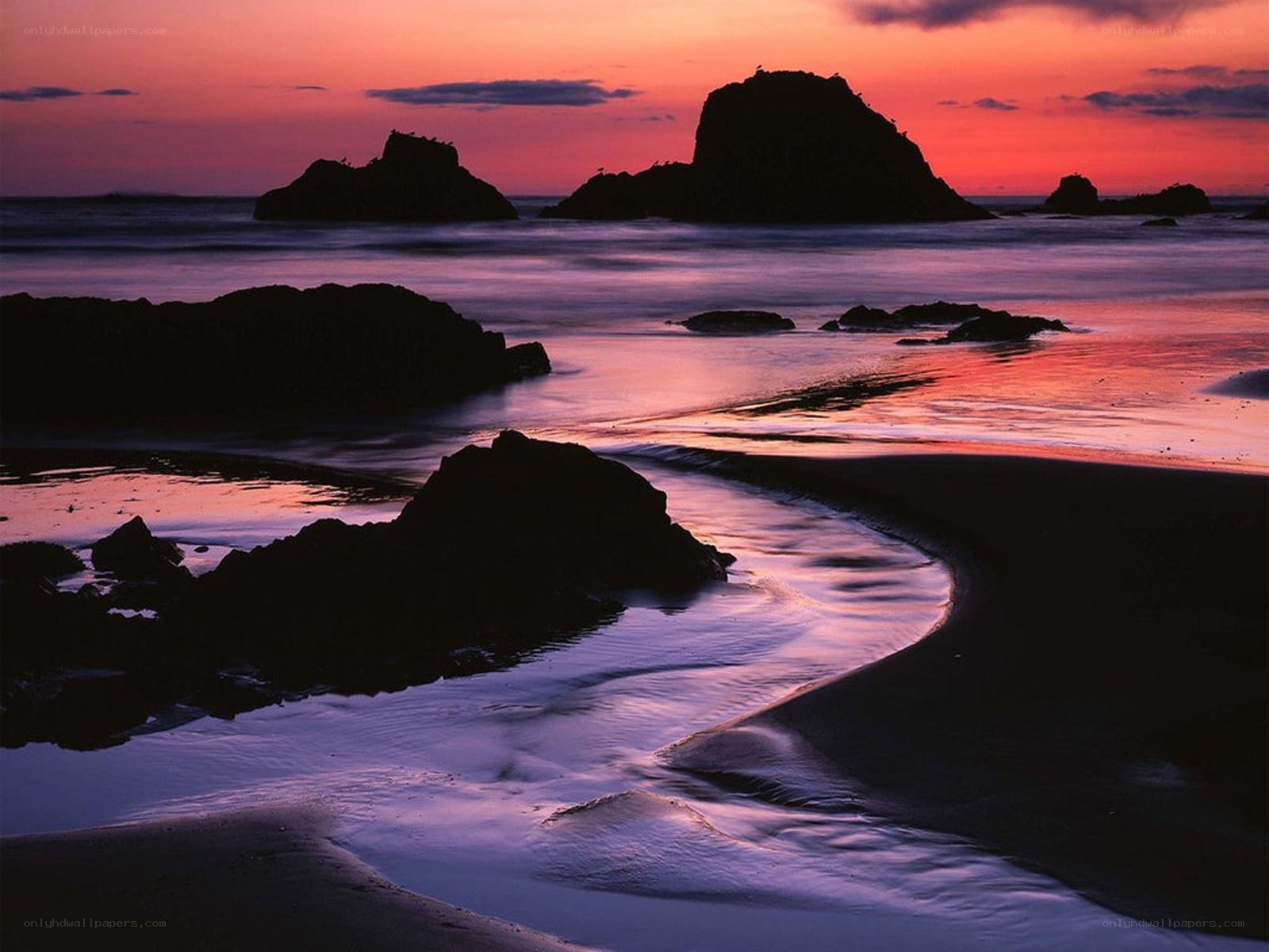 Sunset at the rocky beach