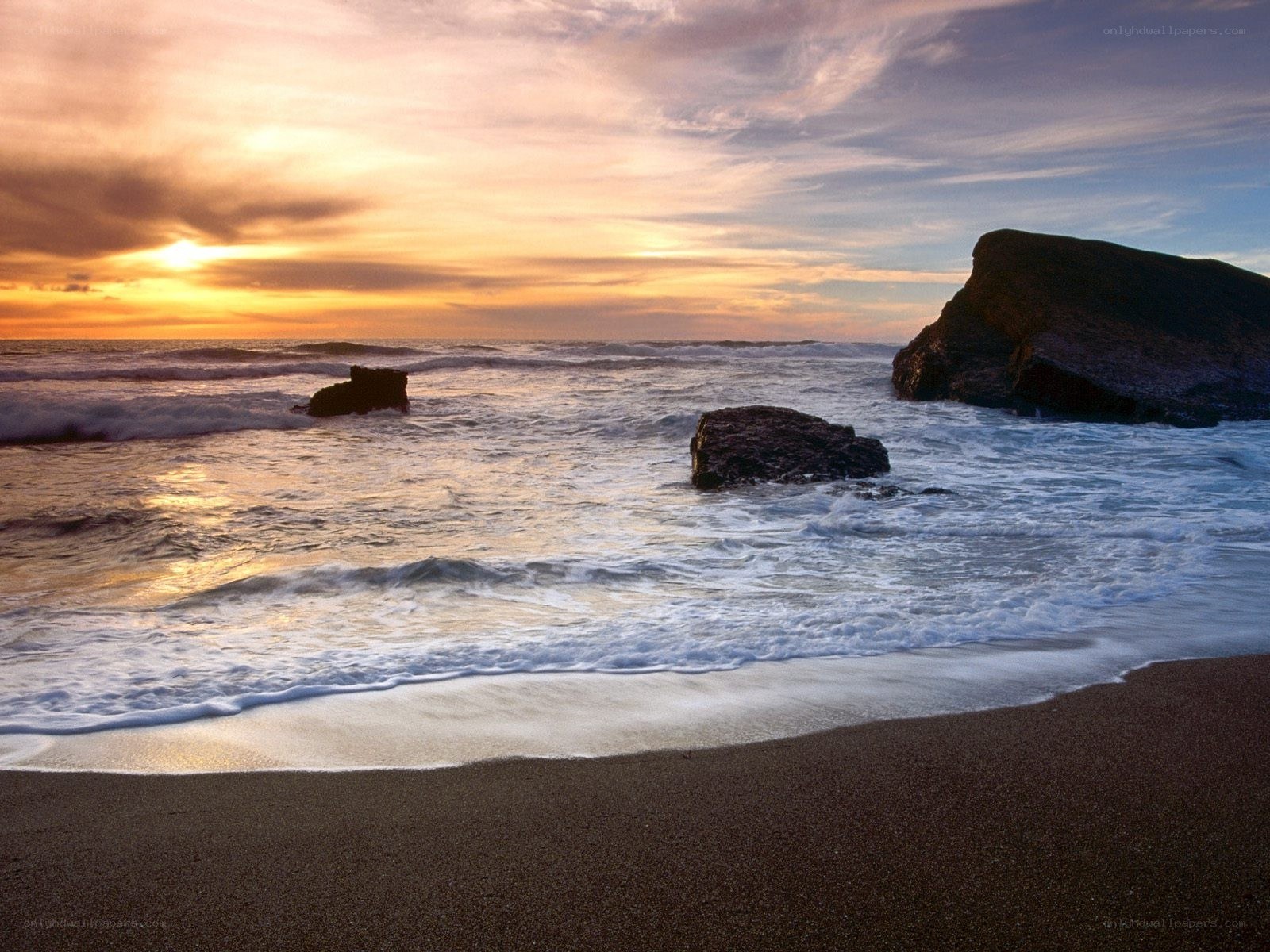 Sunset at the rocky beach
