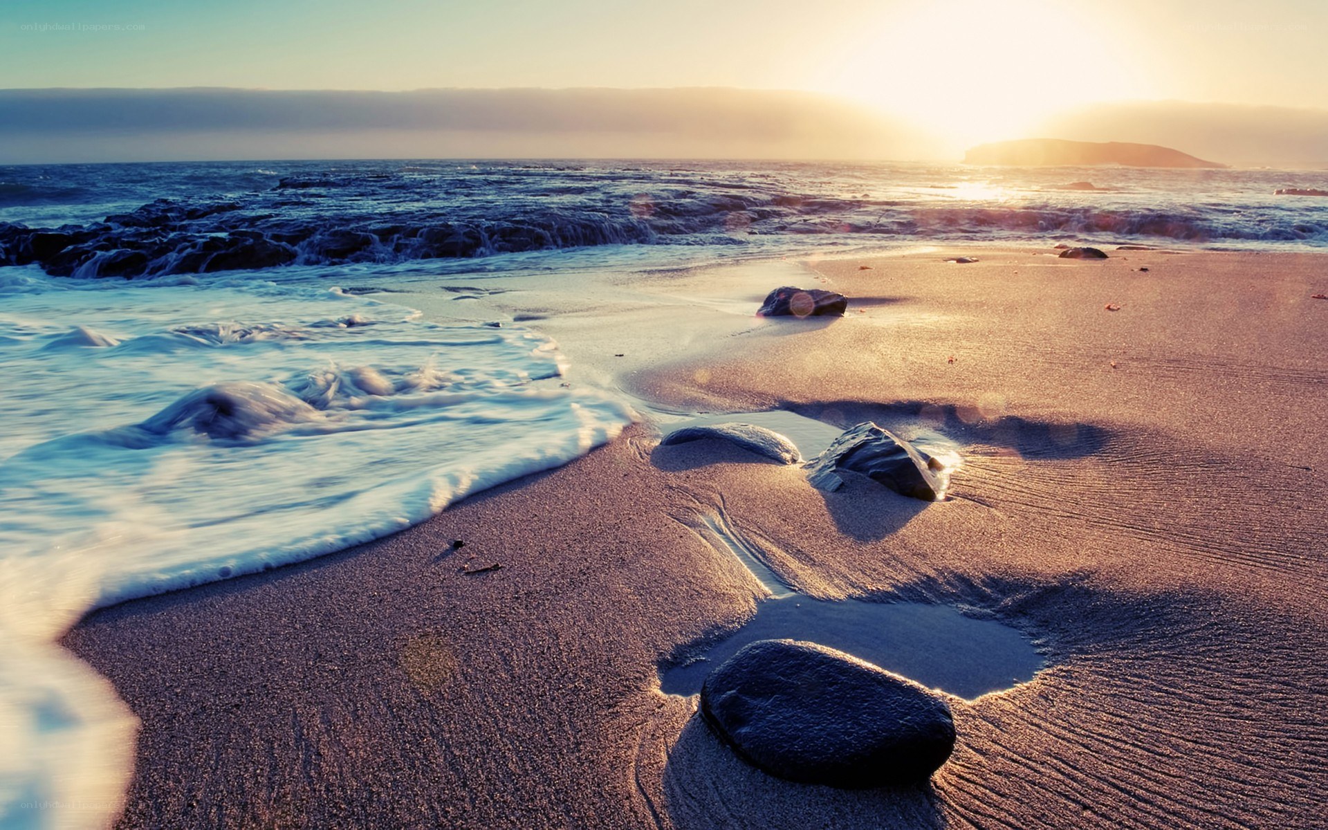 Sunset at the rocky beach
