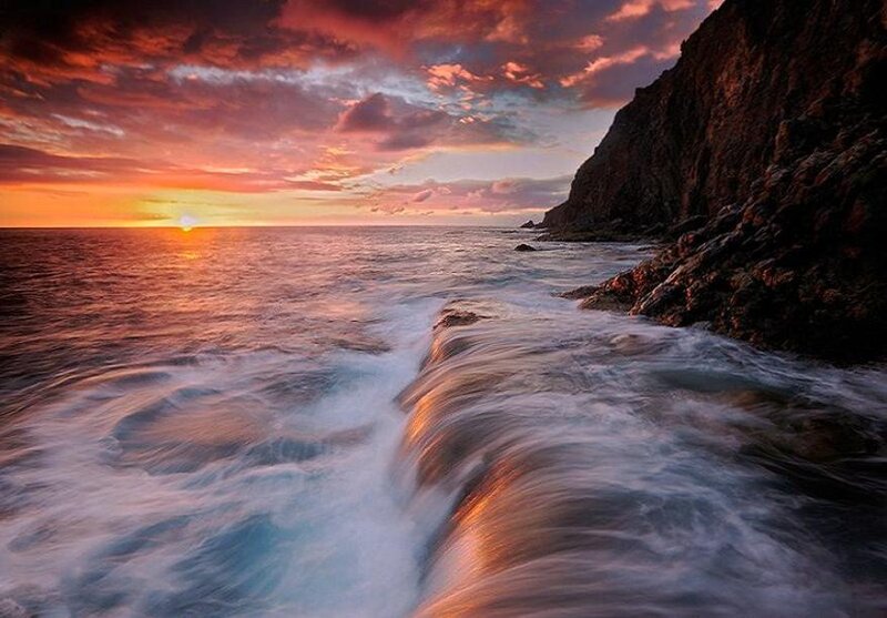 Sunset at the rocky coast