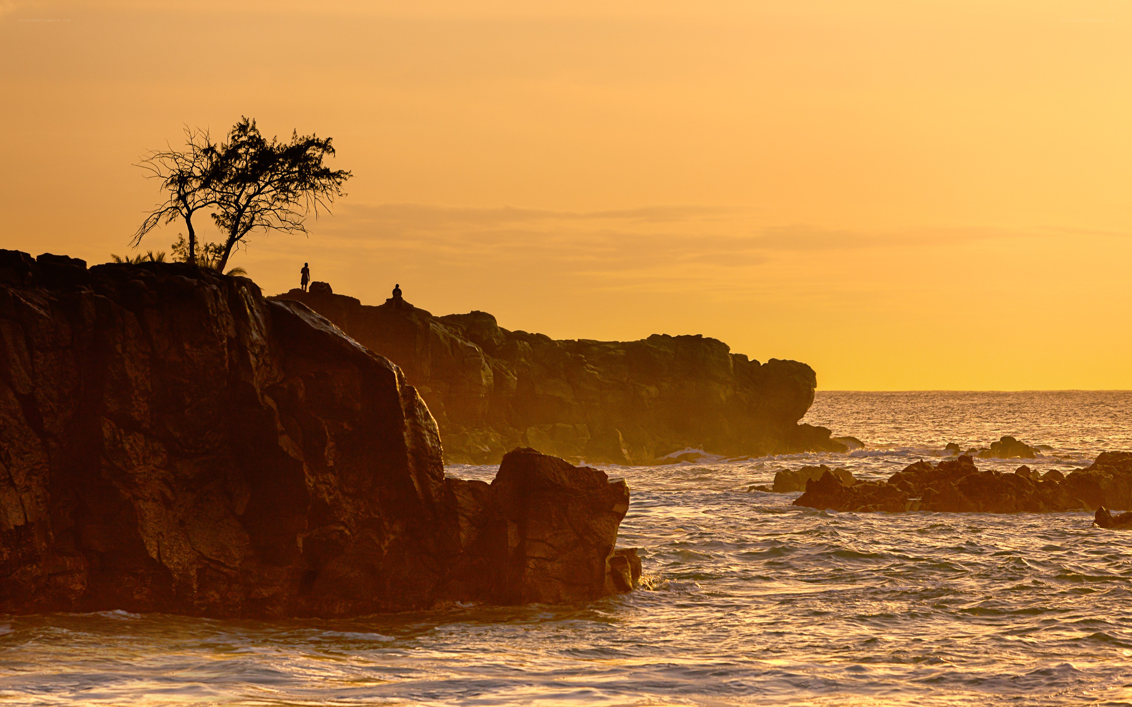 Sunset at the rocky coast