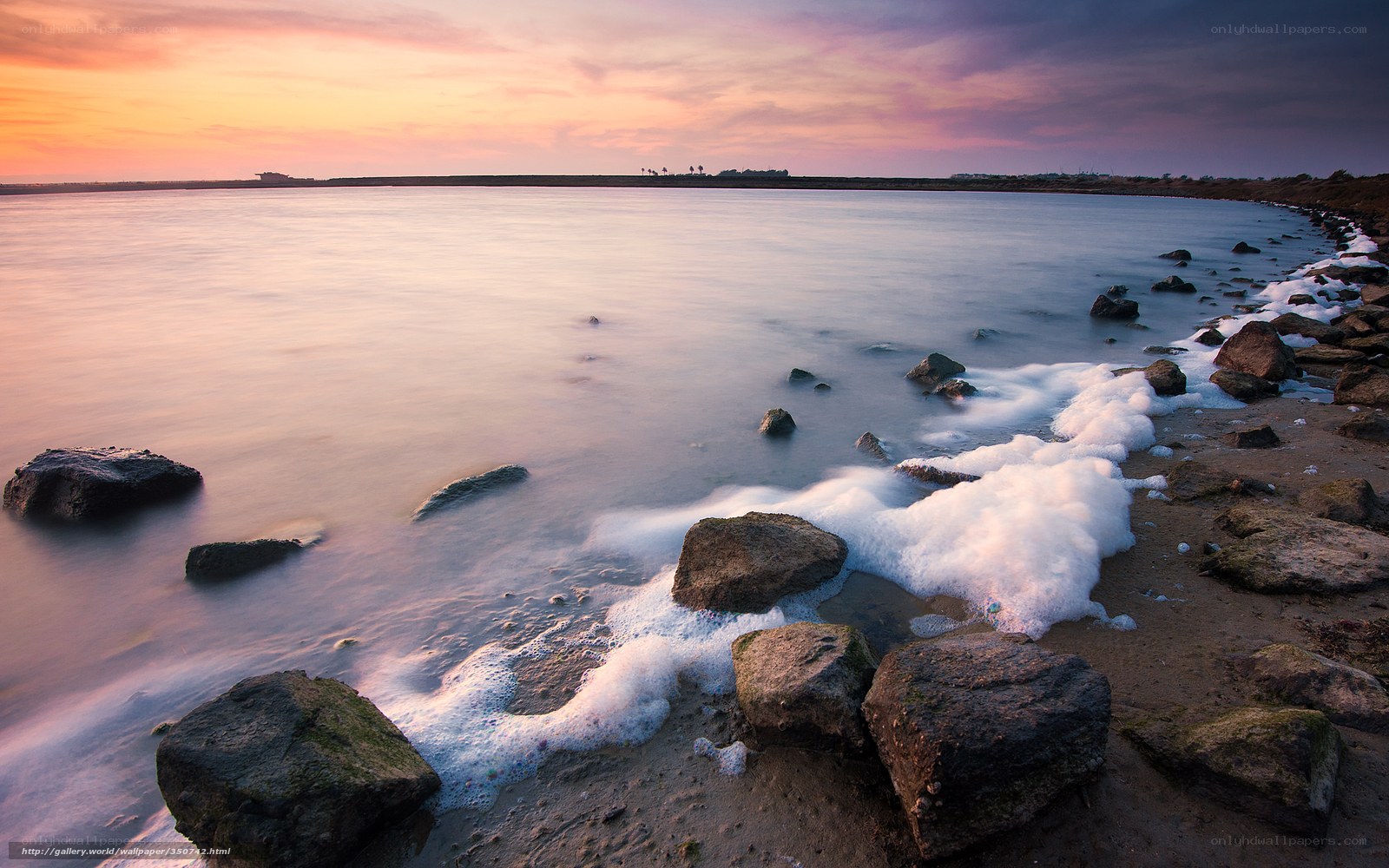 Sunset at the rocky shore