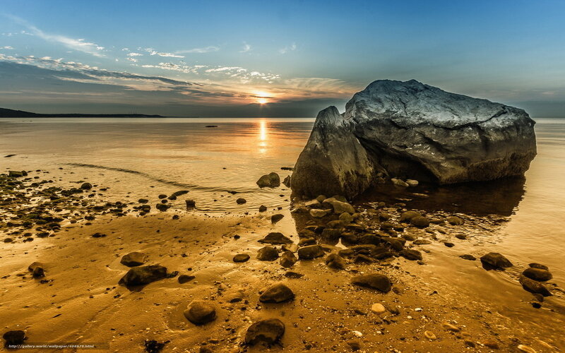 Sunset at the rocky shore