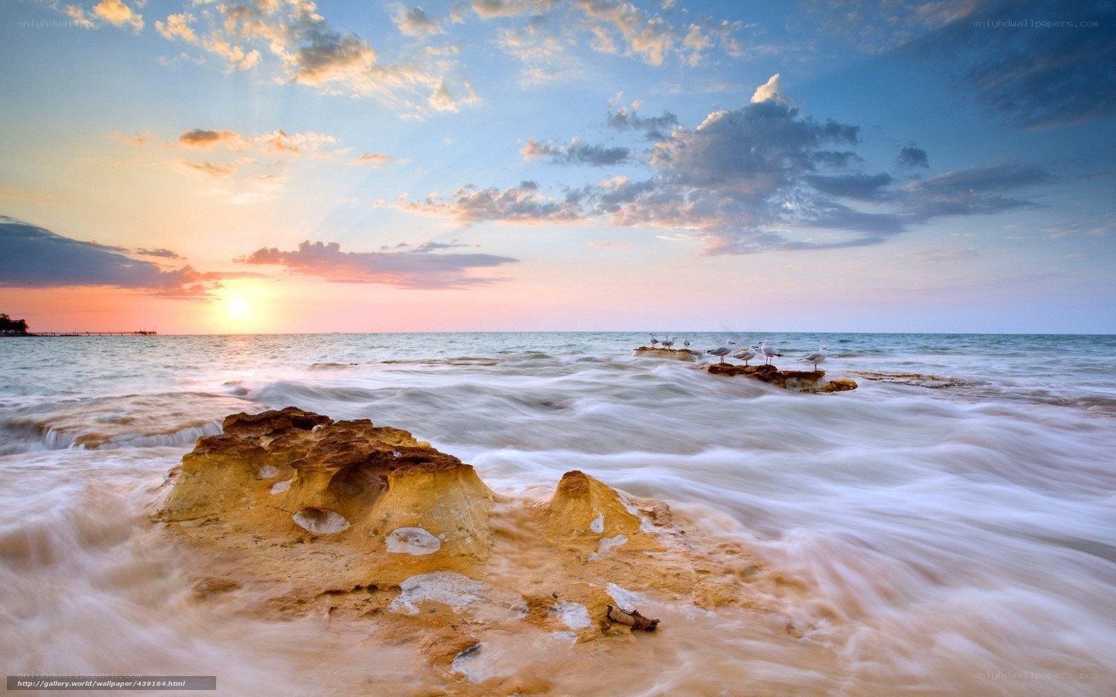 Sunset at the rocky shore