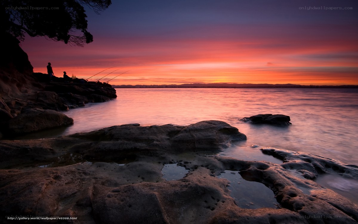 Sunset at the rocky shore