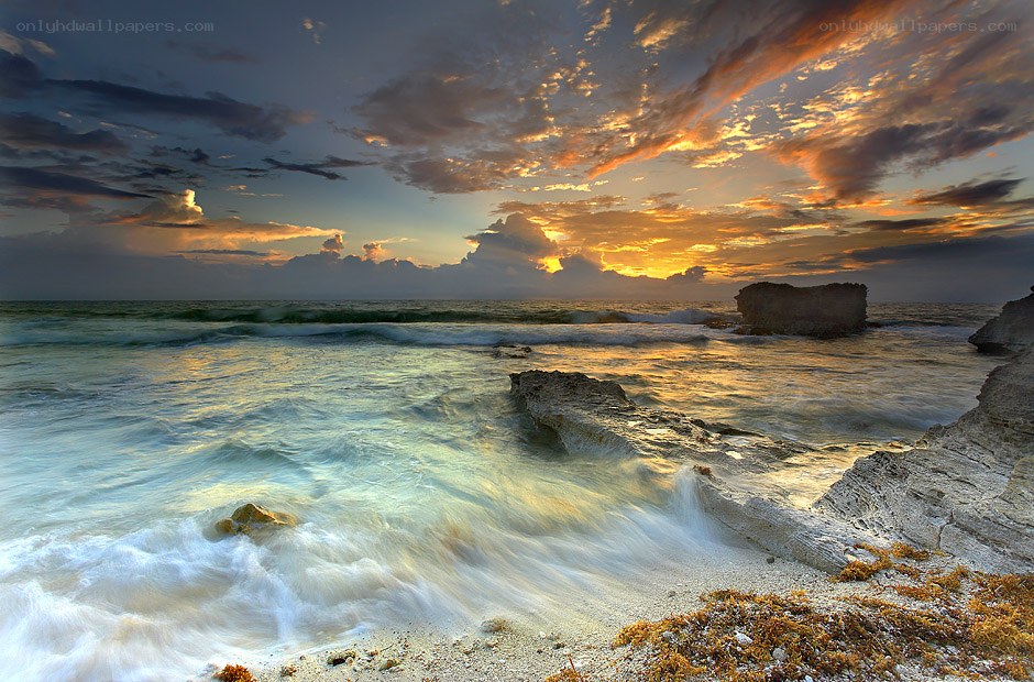 Sunset at the rocky shore