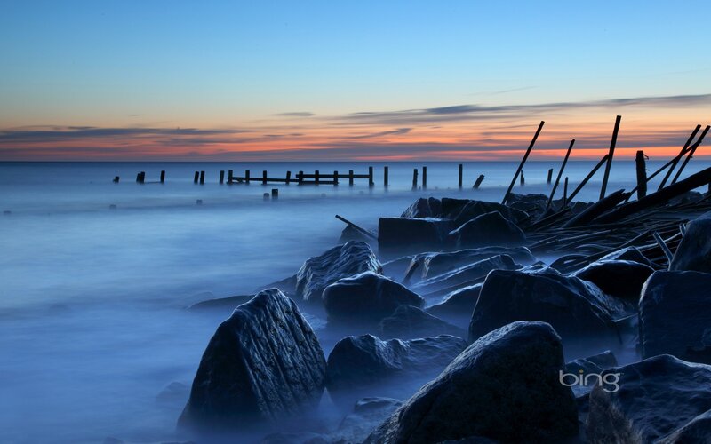 Sunset at the rocky shore