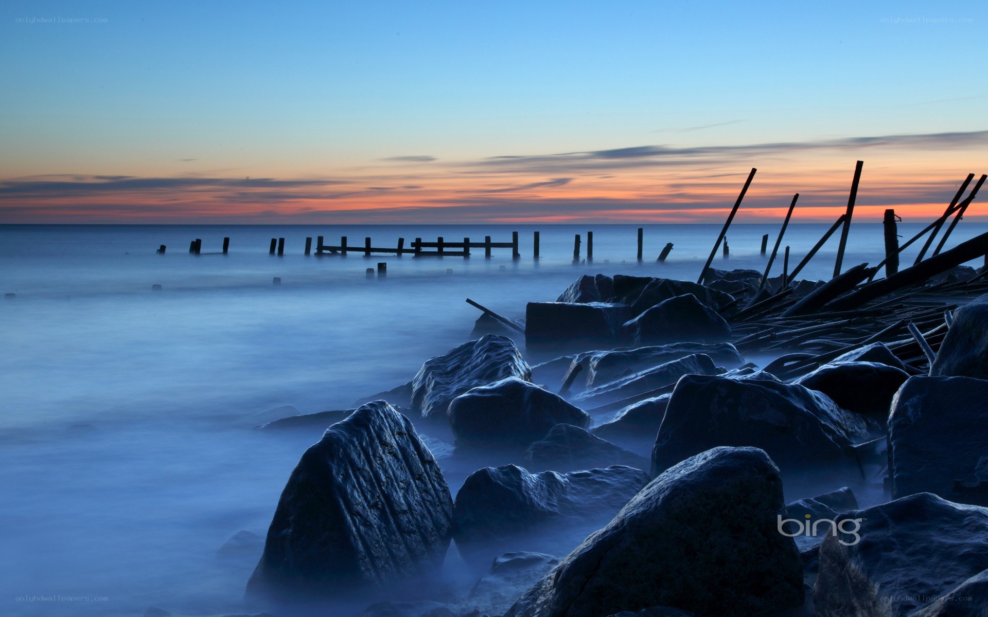 Sunset at the rocky shore