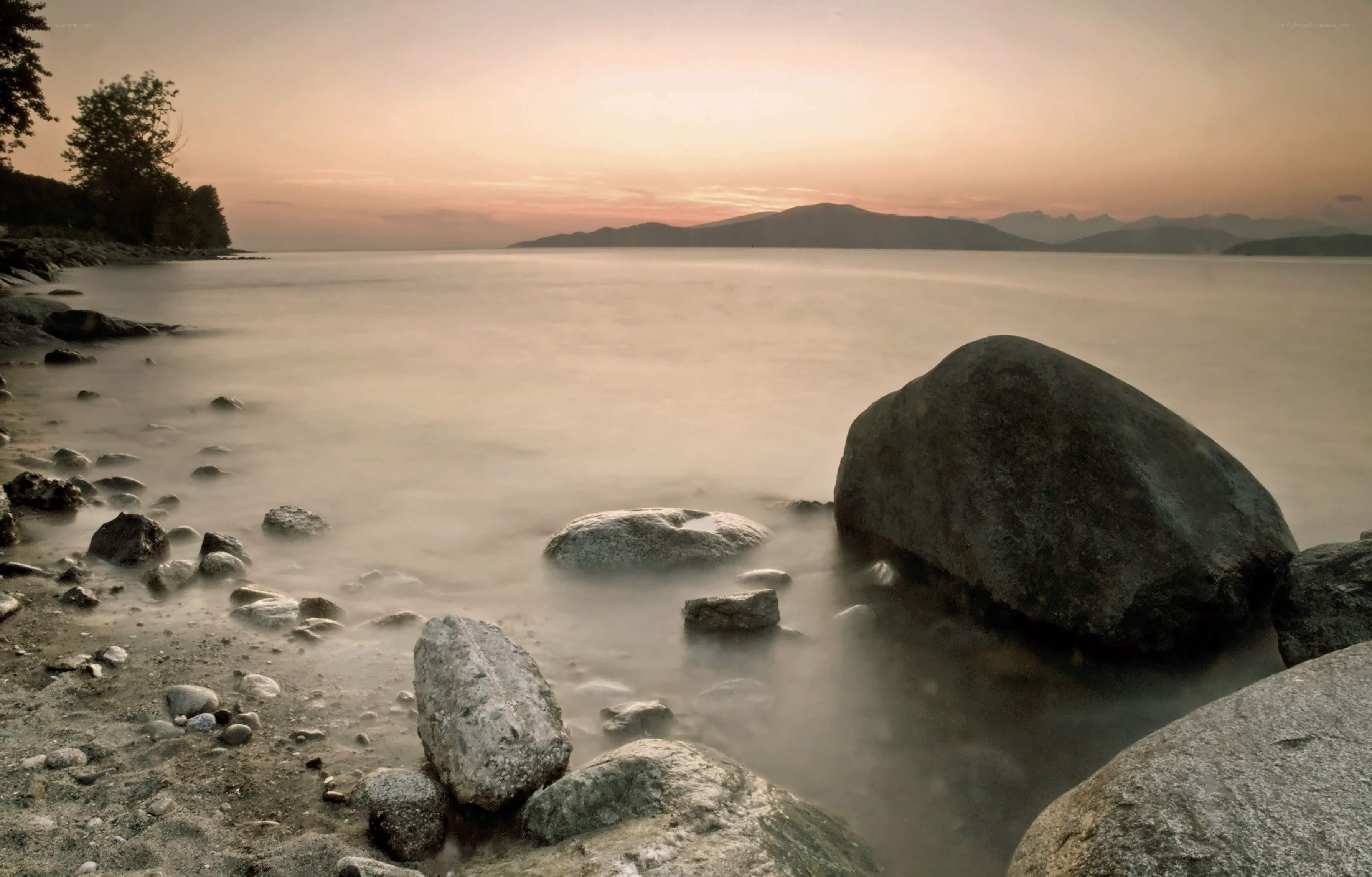 Sunset at the rocky shore