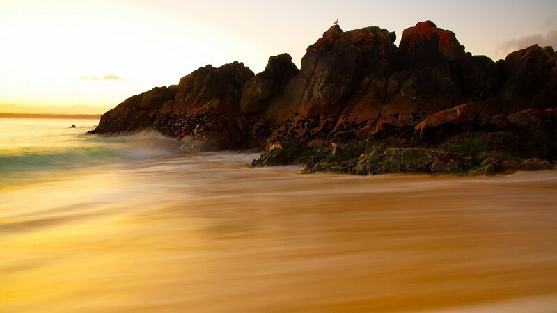 Sunset at the rocky shore