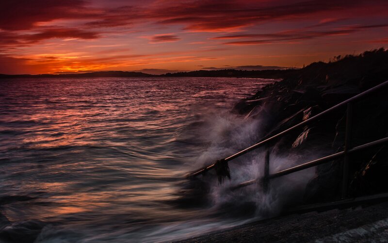 Sunset at the rocky shore