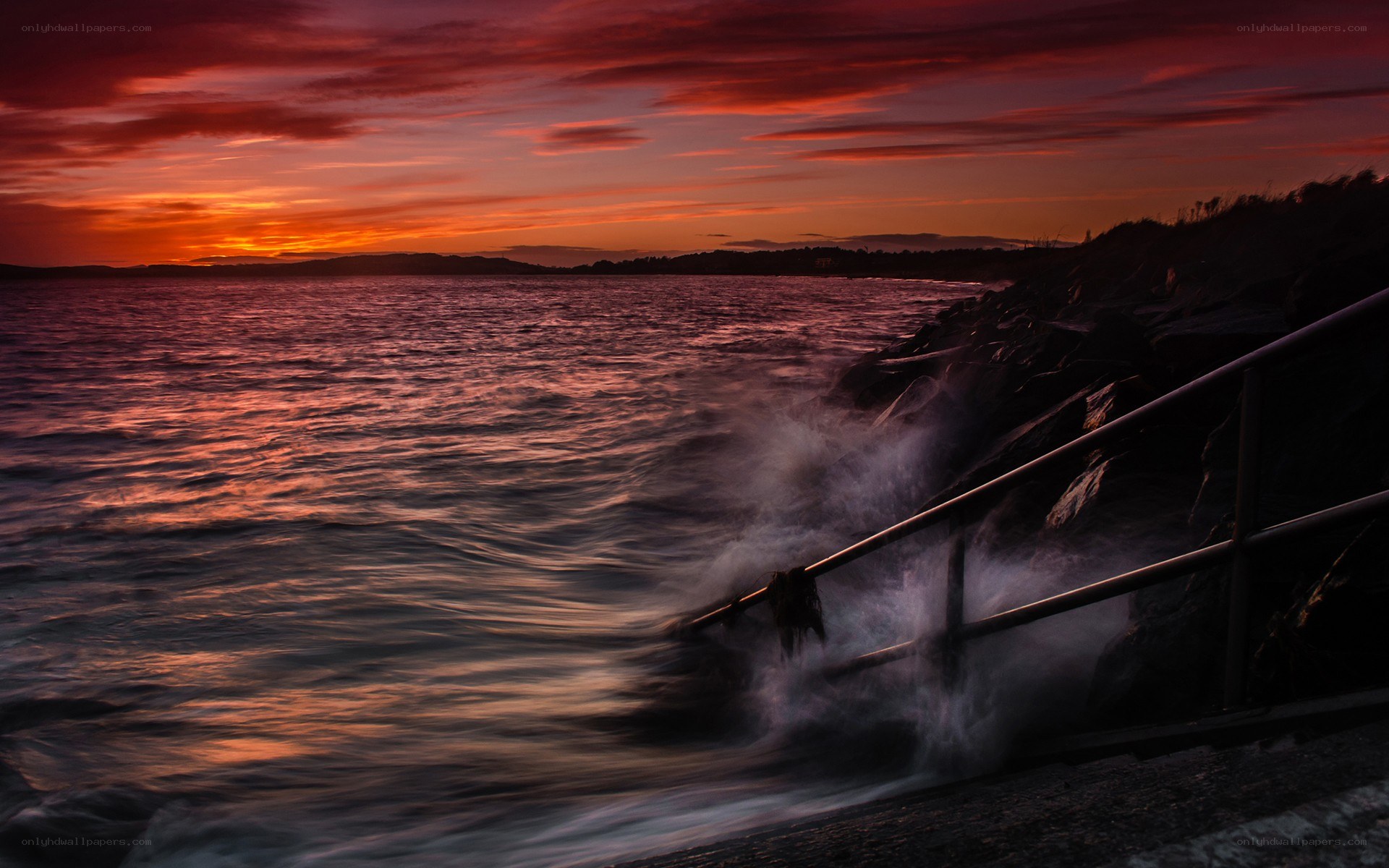 Sunset at the rocky shore