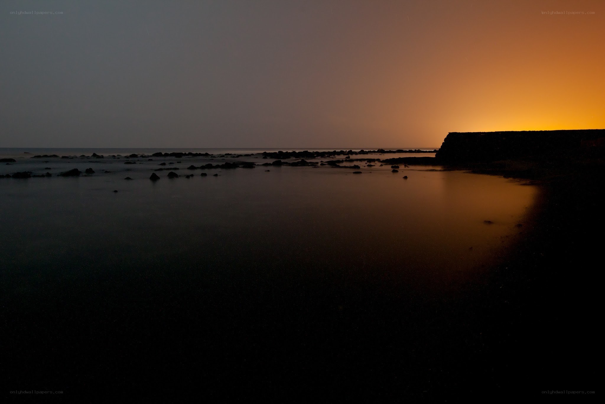sunset at the rocky shore