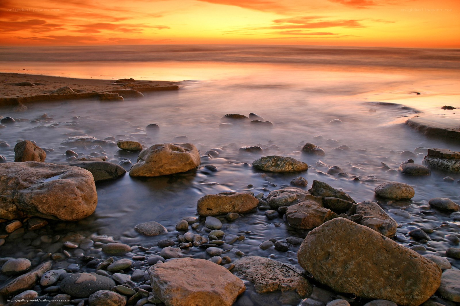 Sunset at the rocky shore