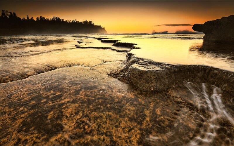Sunset at the rocky shore
