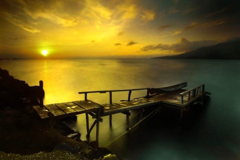 Sunset at the wooden dock