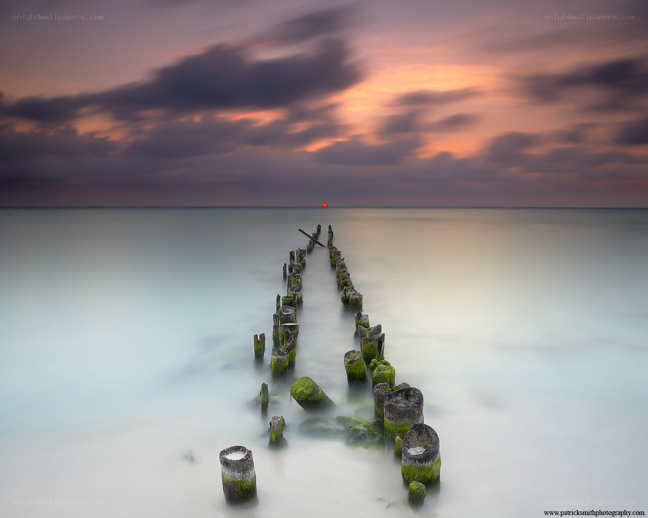 Sunset at the wooden pier